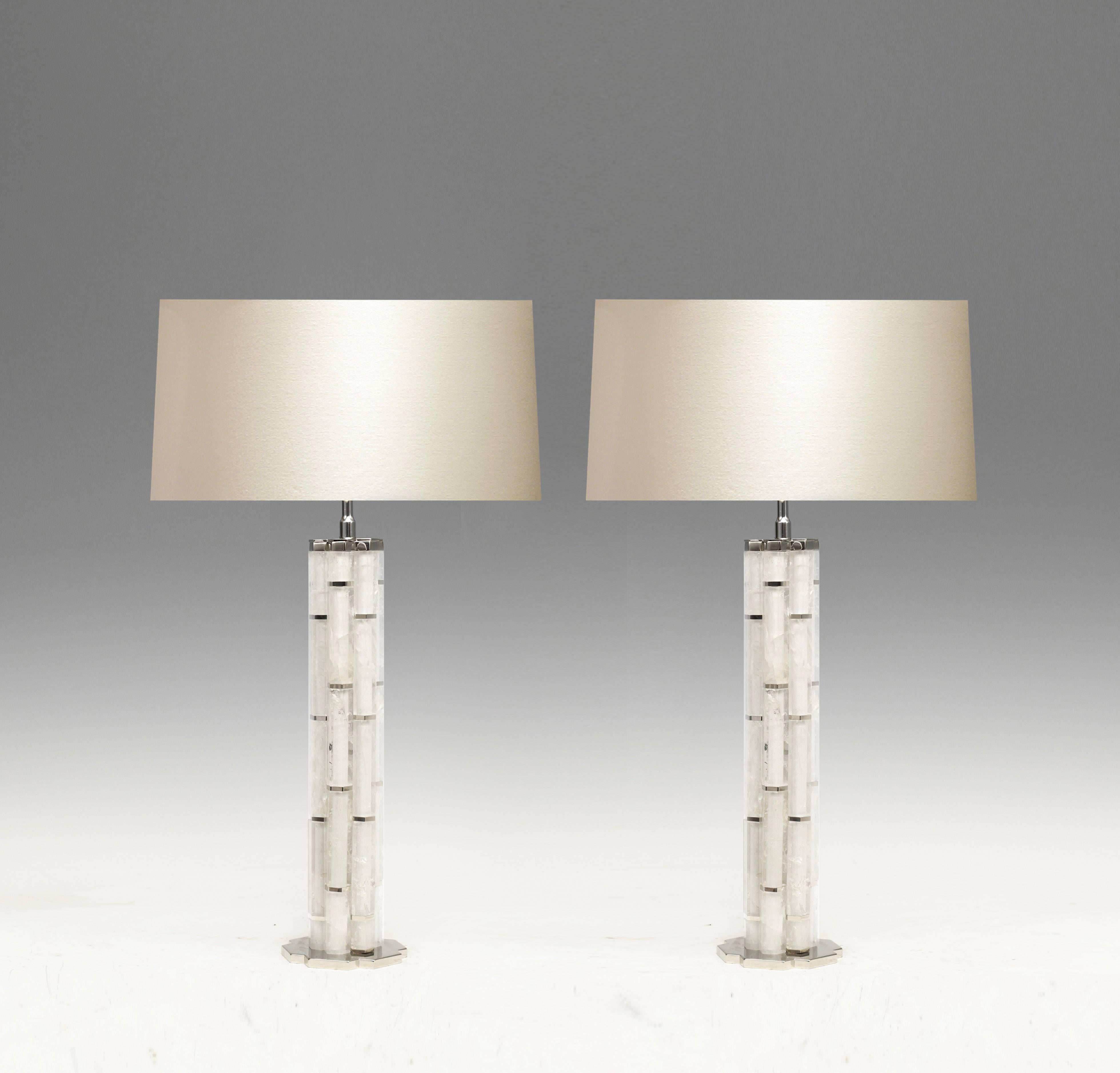 A pair of bamboo inspired  rock crystal quartz Lamps with nickel plating bases and decorations. Created by Phoenix Gallery NYC.
17.5H to the top of rock crystal.
