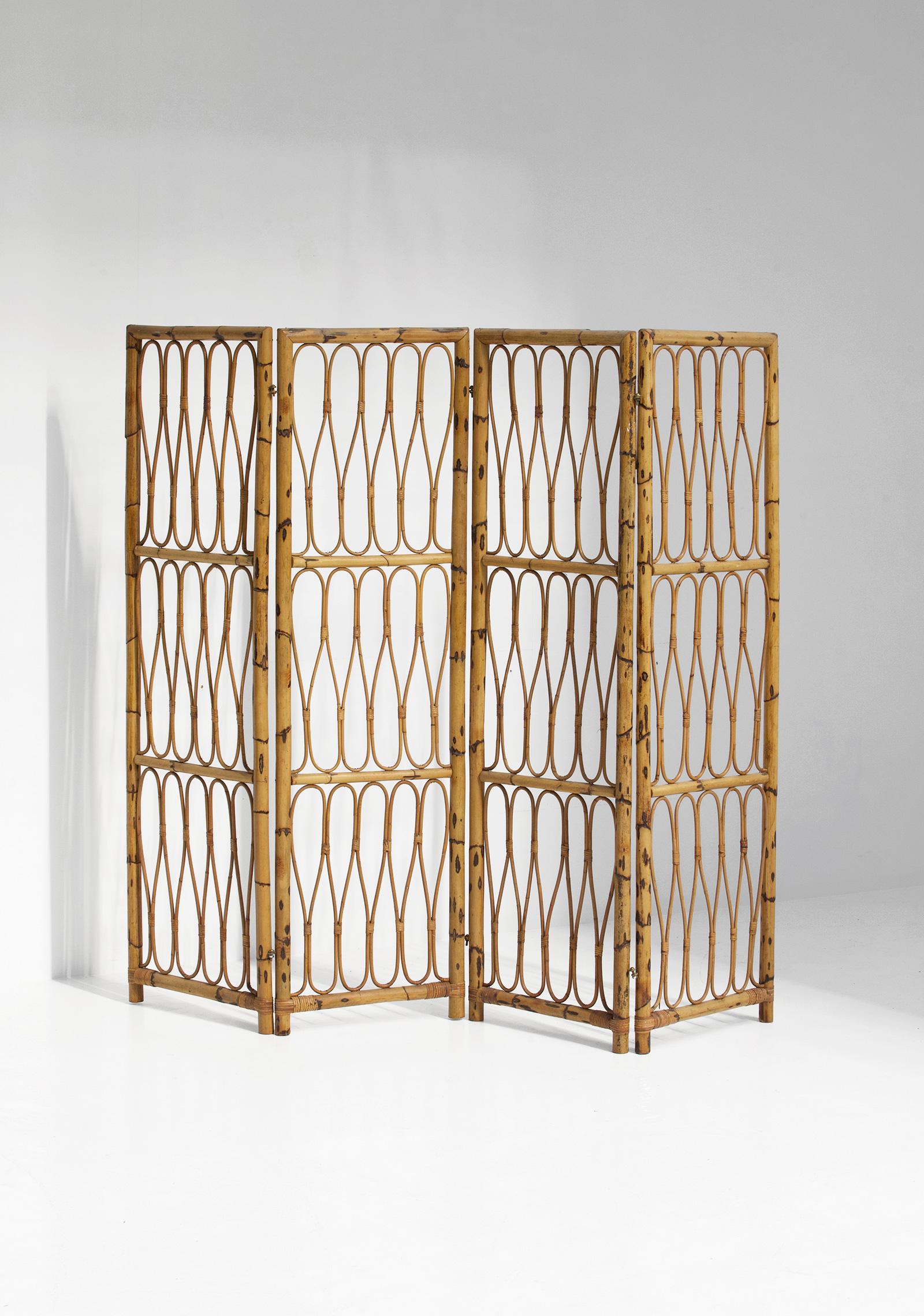Rattan folding screen, Italy 1950s

Bamboo piece in the style of Vivai del Sud, Franco Albini, Gabriella Crespi, Henry Olko
Highly decorative folding screen made in the 1950s. The paravent is fully made in rattan and has little brass attachments