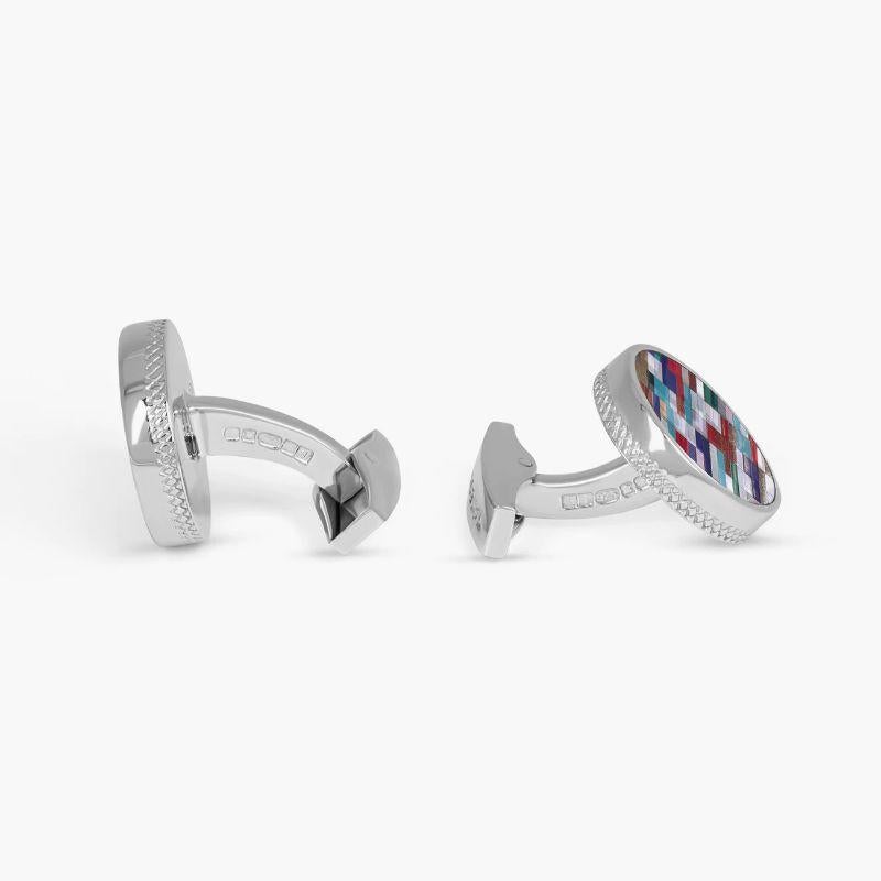 Bamboo Round Cufflinks in Multicolour Tones and Sterling Silver

The flush inlay of semi-precious stone in these cufflinks is sliced in a bamboo mosaic pattern which has been reassembled to increase the luminescence of the piece. The outer case is