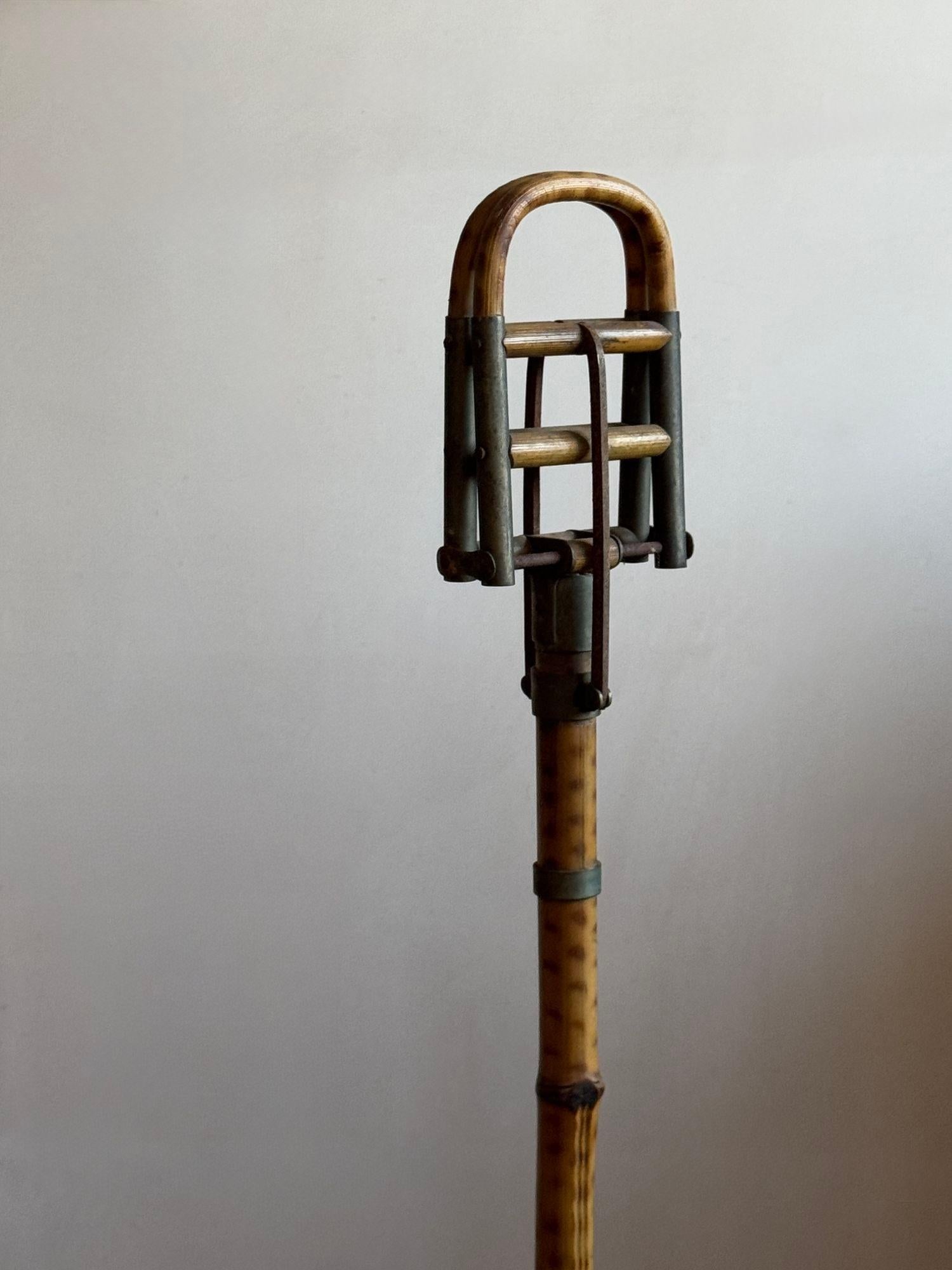 Un bastone da tiro in bambù. Inglese C.1900 Lunghezza 90cm per 11cm di larghezza e 4cm di profondità.