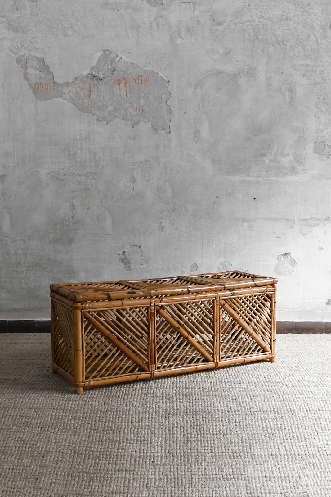 Bamboo storage bench with geometric cane patterns, 1980s
Product Details
Glossy natural finish.
Dimensions: 120 W × 49 H × 42.5 D cm