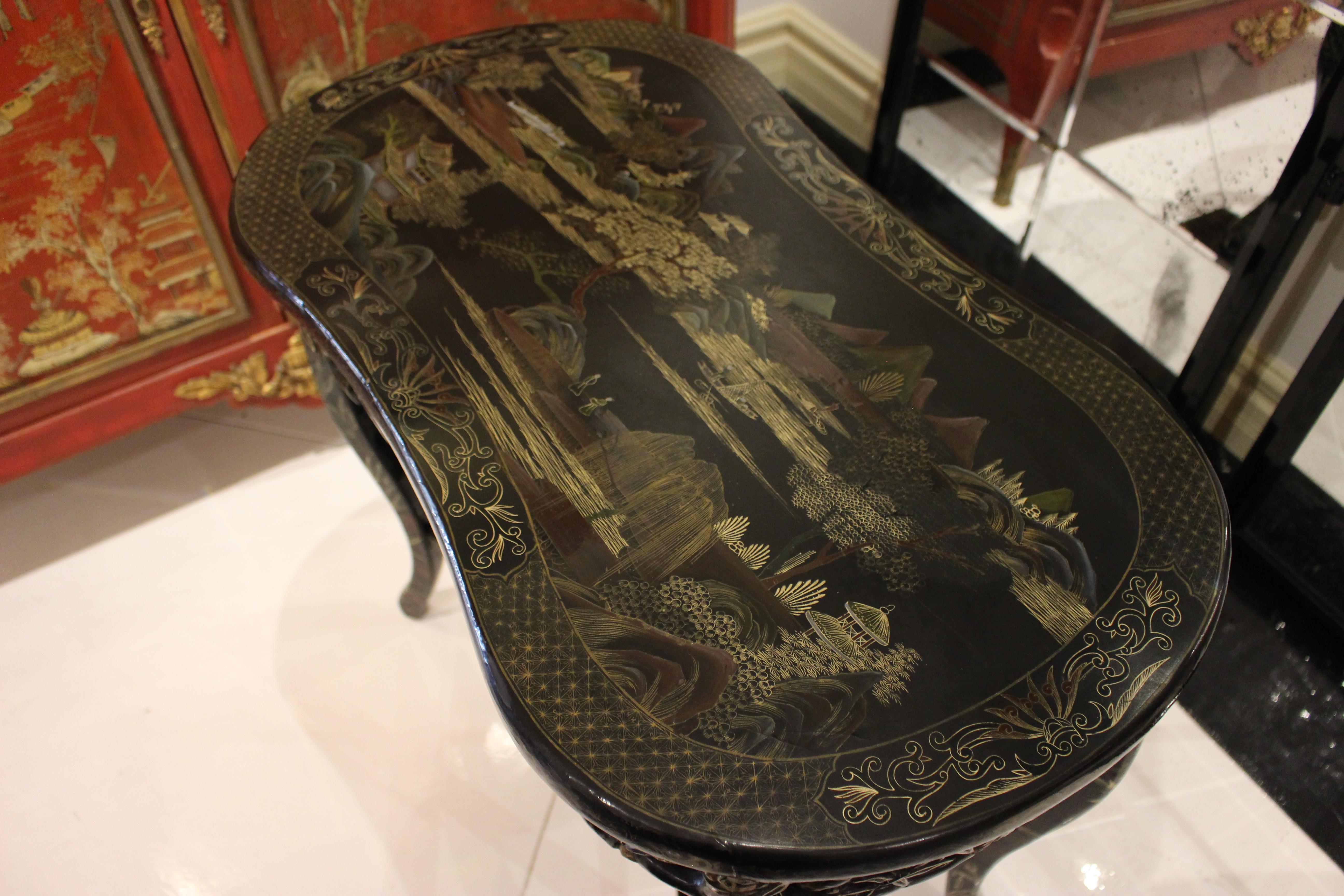 Bamboo style carved ebonized 4 leg table with cross stretcher finished with chinoiserie pantry, Circa 1875.