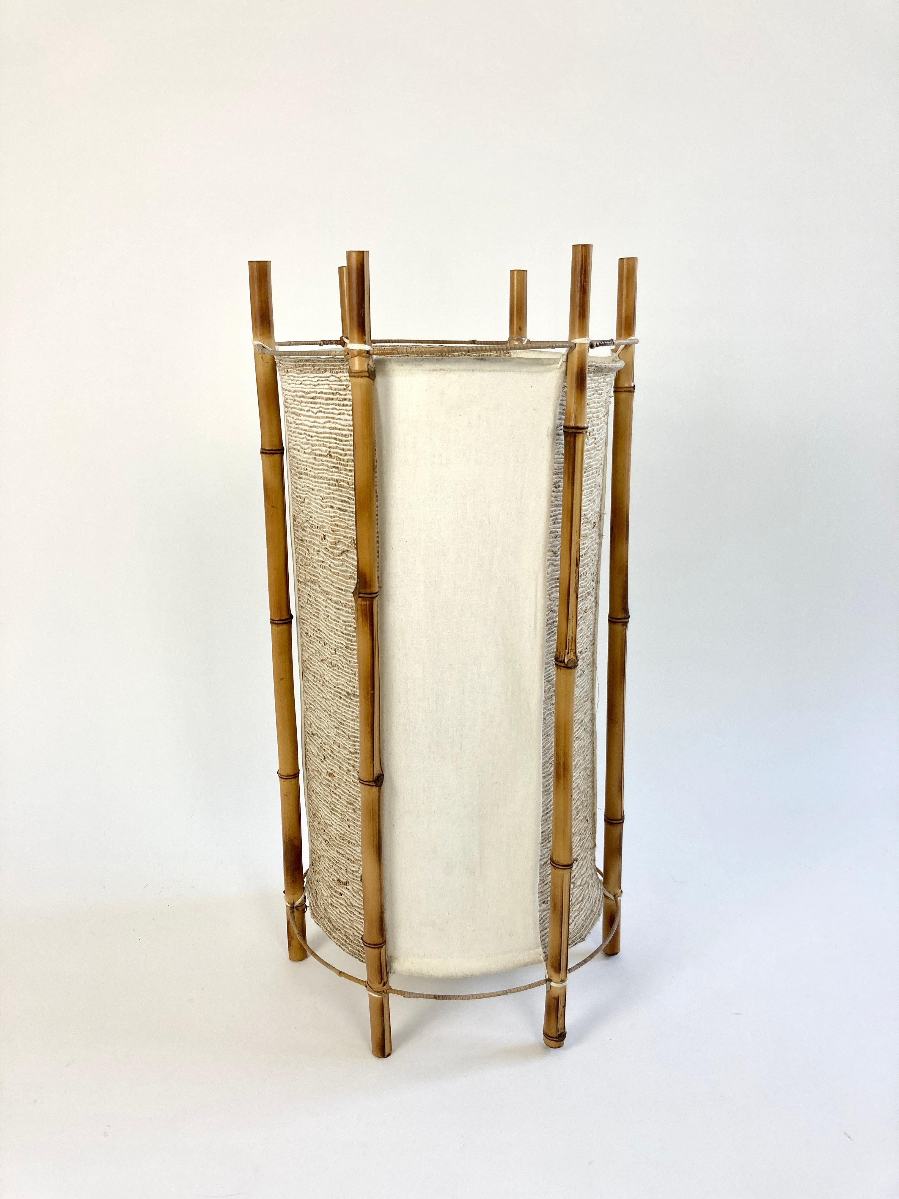 Vintage bamboo table lamp from France, circa 1960, Louis Sognot attributed.

A large table lamp which could also be used a small floor lamp.

