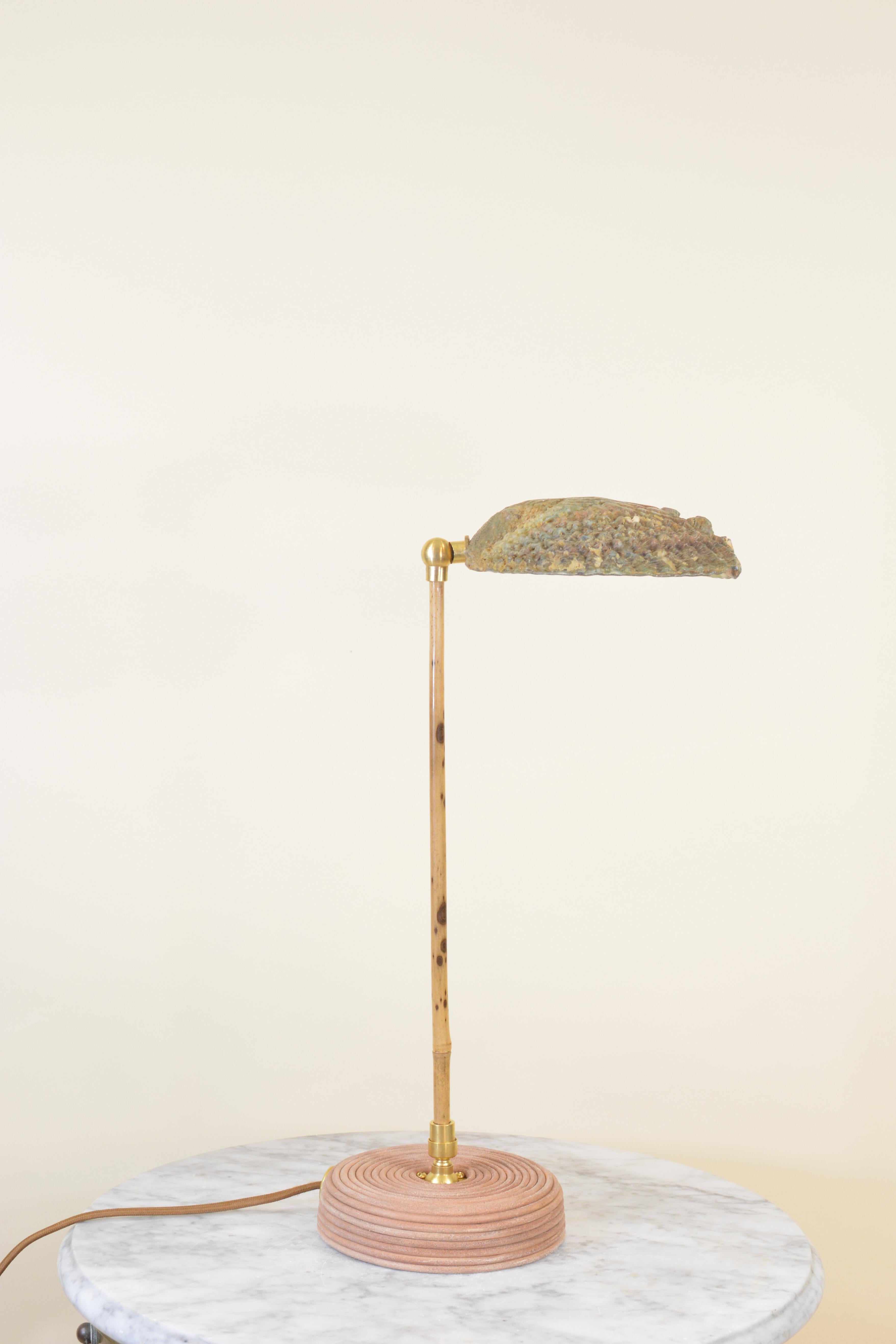 Introducing the Ligurian Summer Collection, a sophisticated family of handmade fixtures in natural sea shell, coiled leather, marble, and bamboo, inspired by the faded splendor of the northern Italian coast.

Model No. 033 features a coiled
