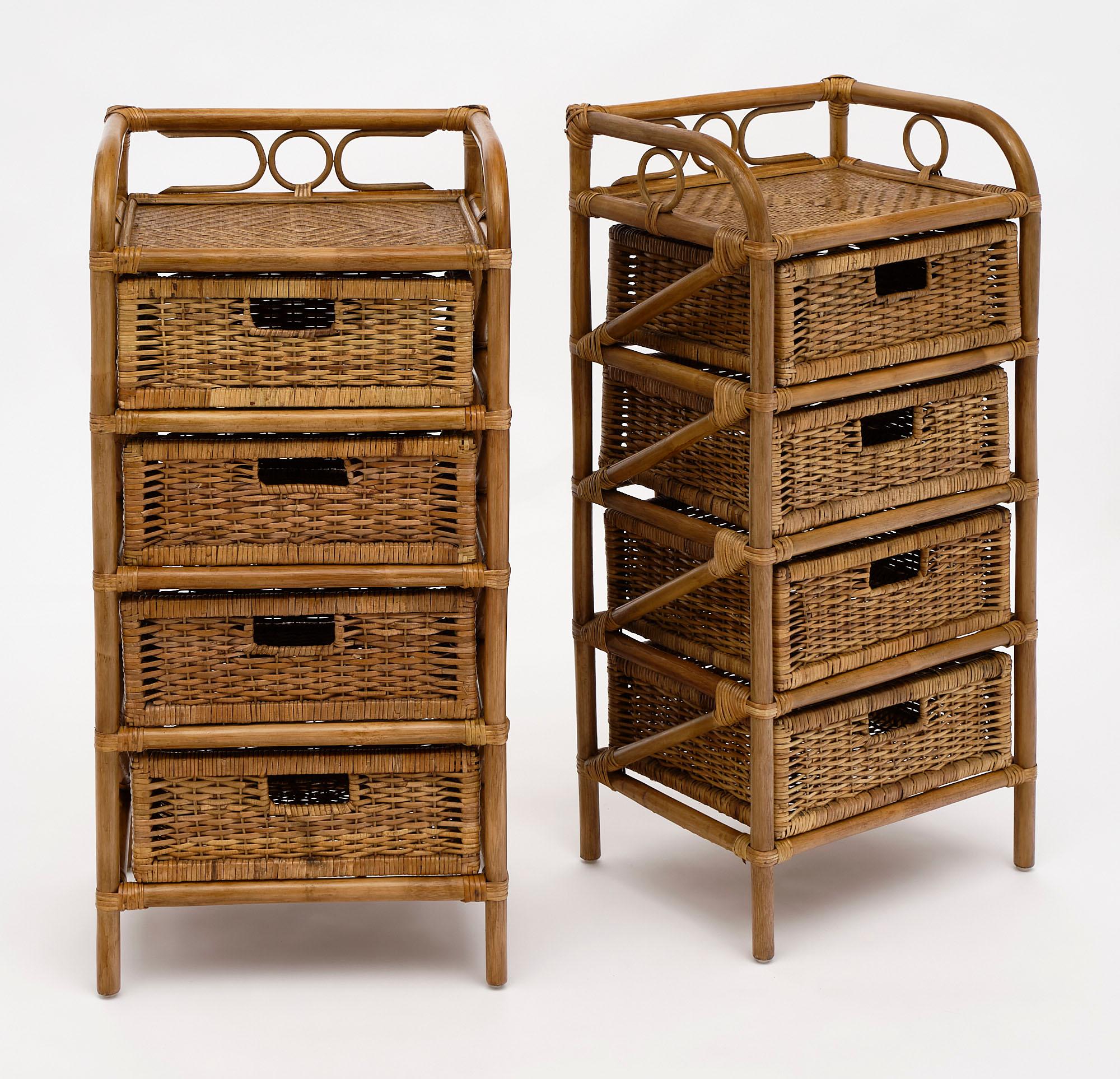 Bamboo vintage French side tables made of rattan and wicker in the manner of Audoux Minet. Each has four drawers and a top shelf.
