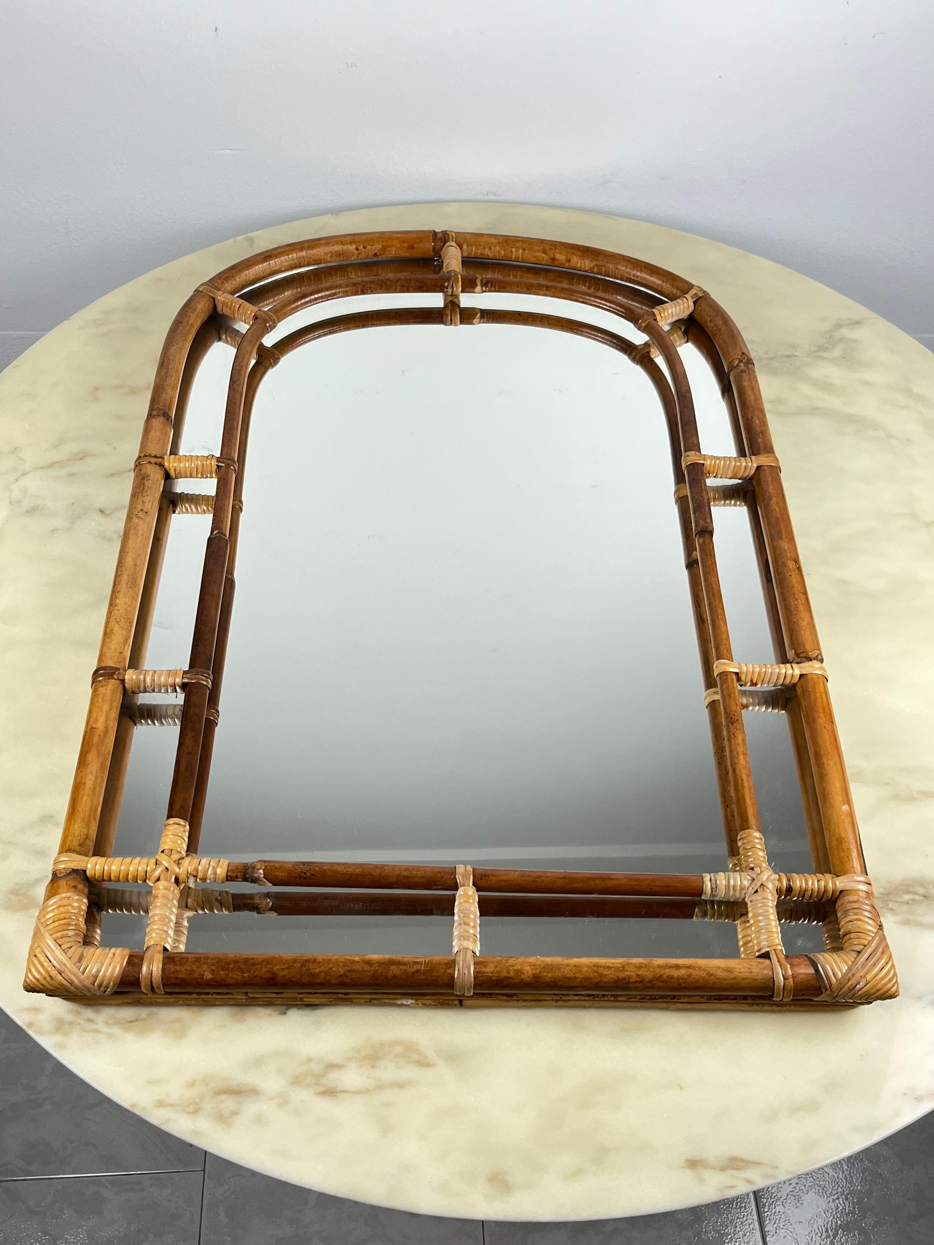 Bamboo wall mirror, attributed to Vittorio Bonacina, 1960s 
Purchased by my grandparents, it was used in the family villa.
It is in excellent condition and shows very small signs of ageing.