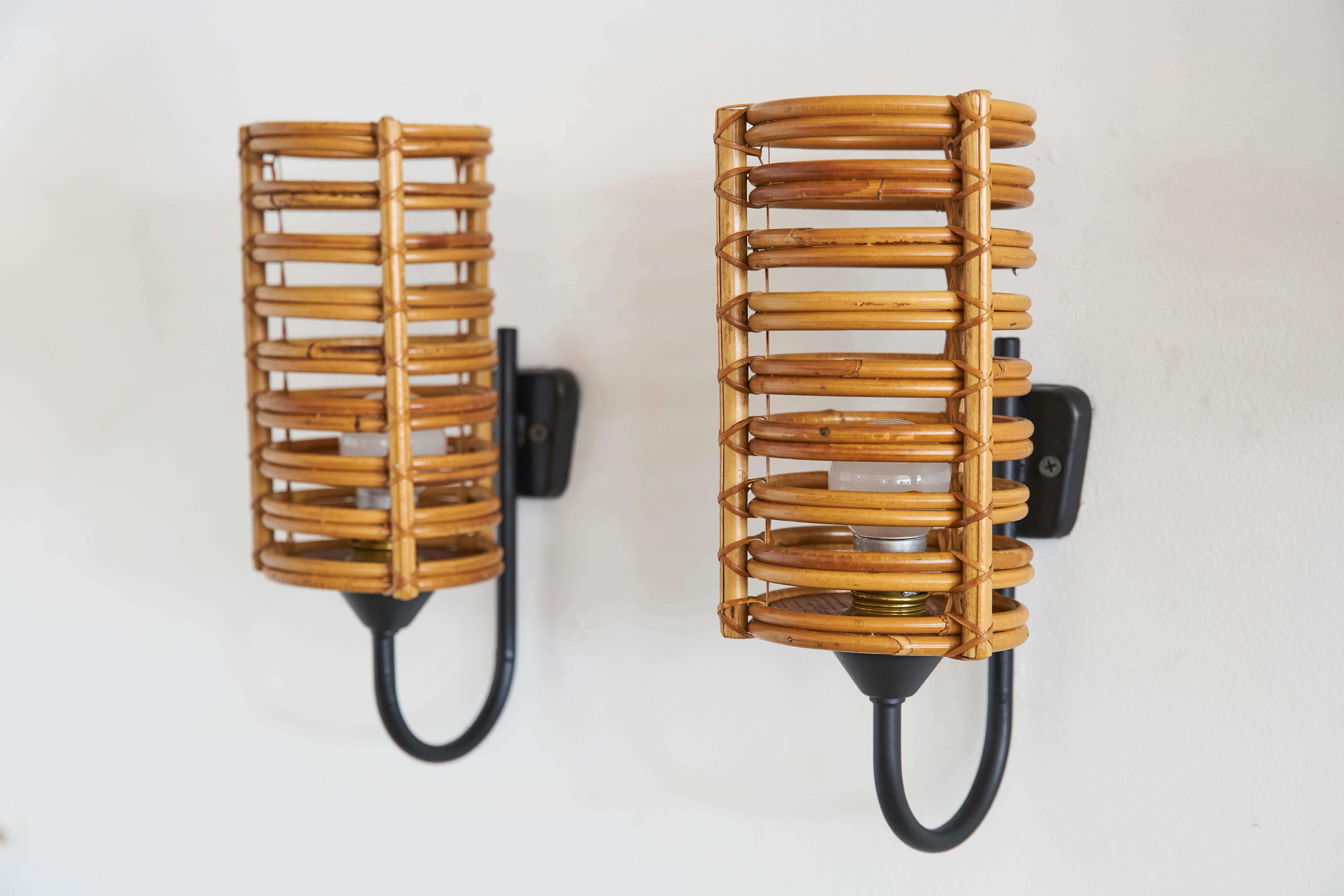 French bamboo wall sconces attributed to Louis Sognot
Torchiere shape with black iron arm.
Newly rewired.
 
H 11