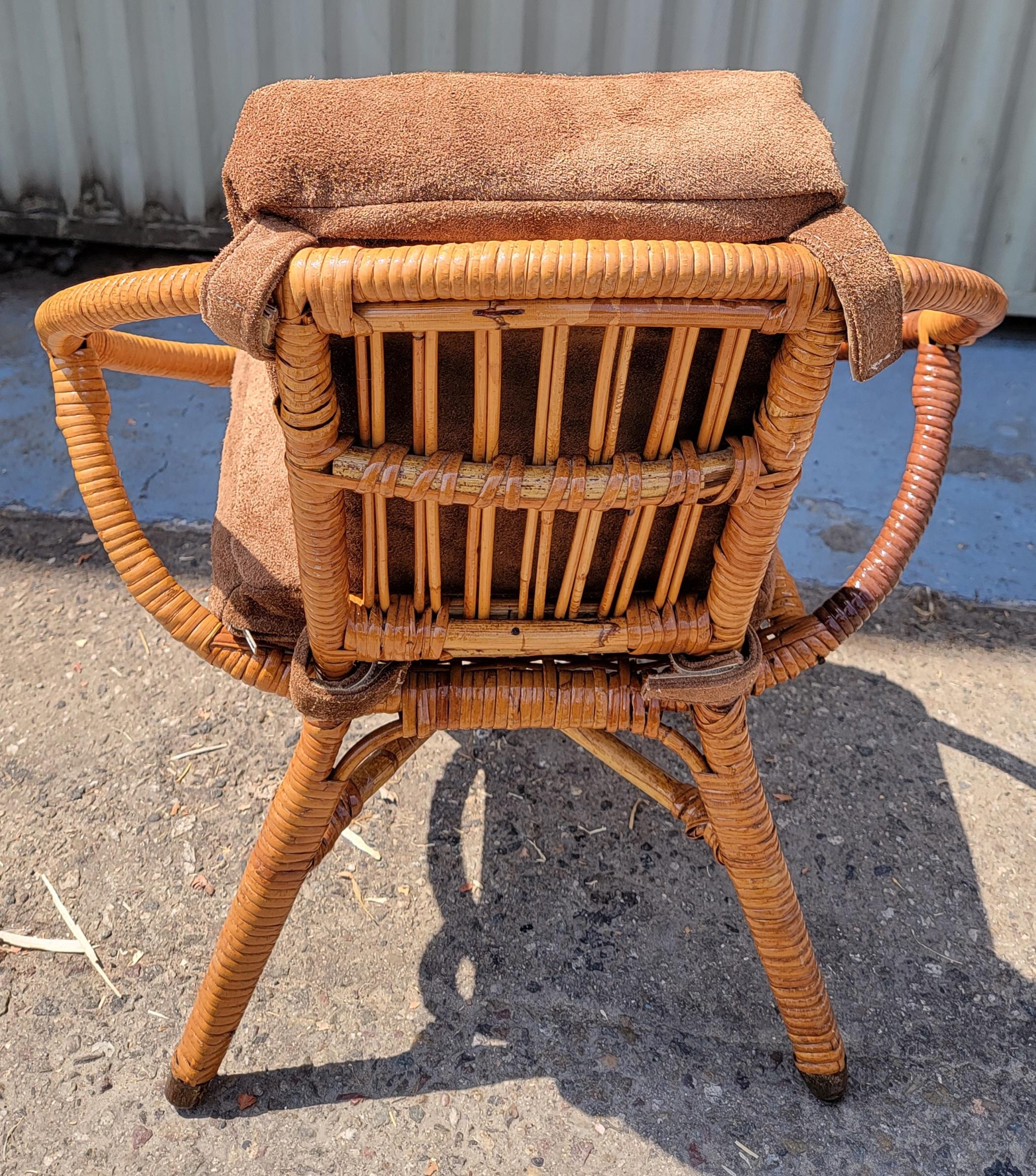 This amazing mid century child's bamboo chair in pristine condition has custom made suede seat & back cushions.It is an amazing sturdy  chair.