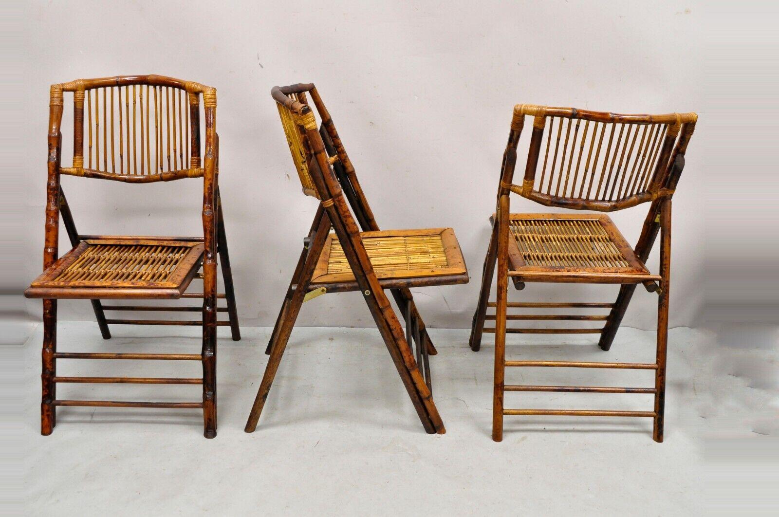 Bamboo wooden folding chairs for game table or events - set of 4. Item features (4) folding side chairs, bamboo wooden construction, very nice vintage set, great style and form. Circa mid to late 20th century.
Measurements: 
Open: 35