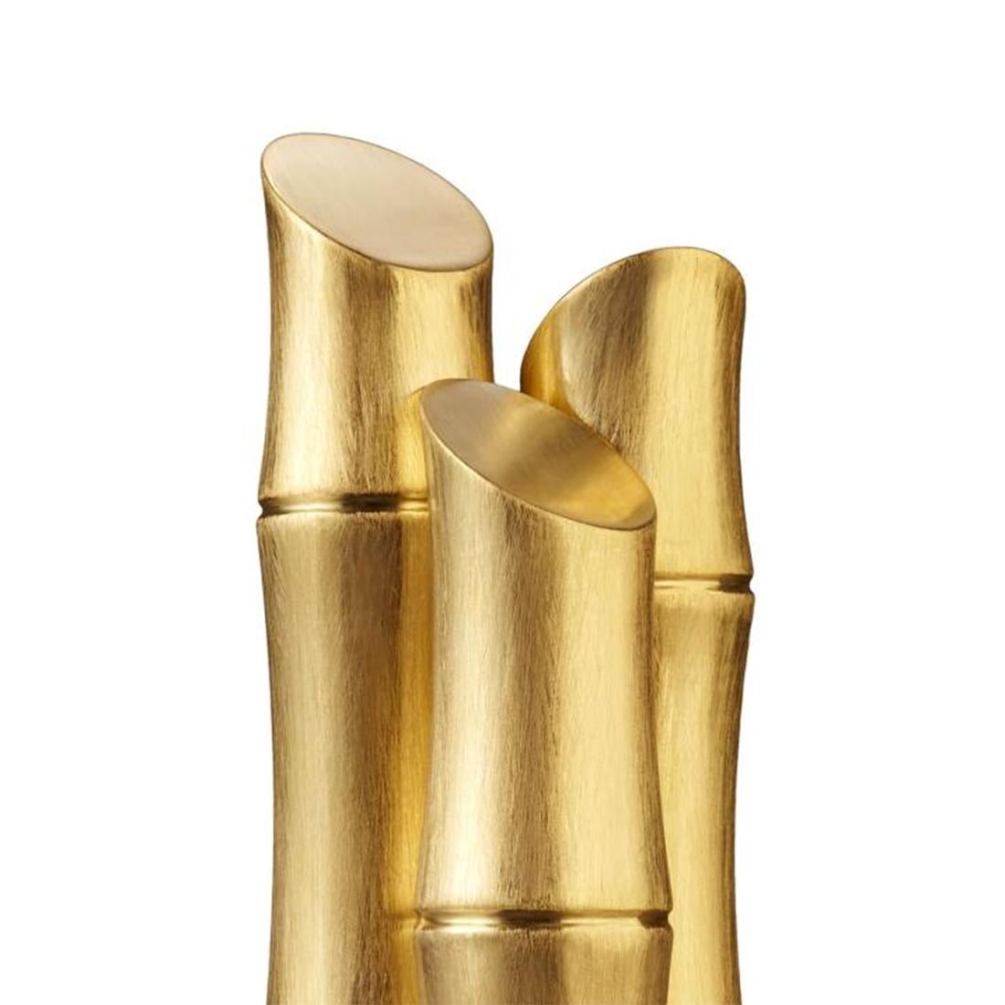 Bookends bamboos gold set of 2 in polished
stainless steel, 24-karat gold-plated handcrafted.
Each piece: L 8 x D 8 x H 20cm.