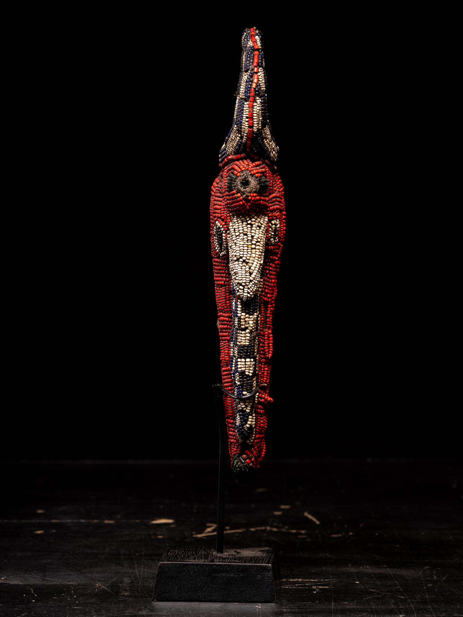 20th Century Bamileke Decorative Wooden Flute or Whistle embroidered with European Glass Bead For Sale
