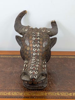 Bamileke Royal Buffalo Helmet Mask with Colonial Coin Embellishment