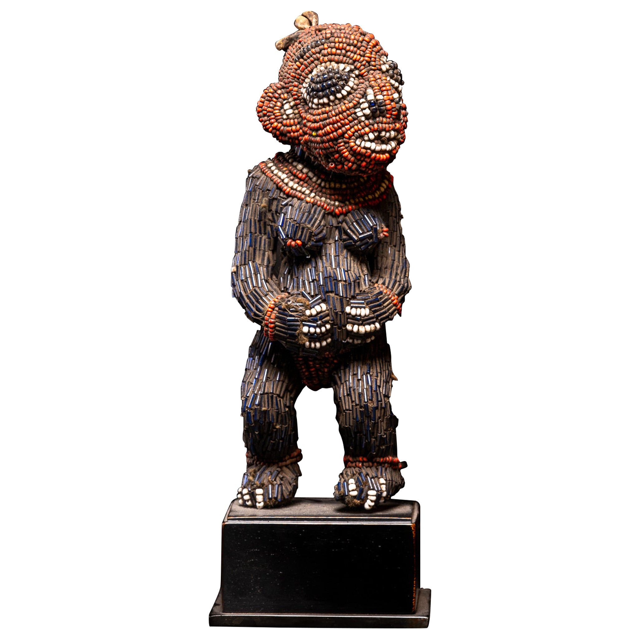 What are carved wood figures in African art?