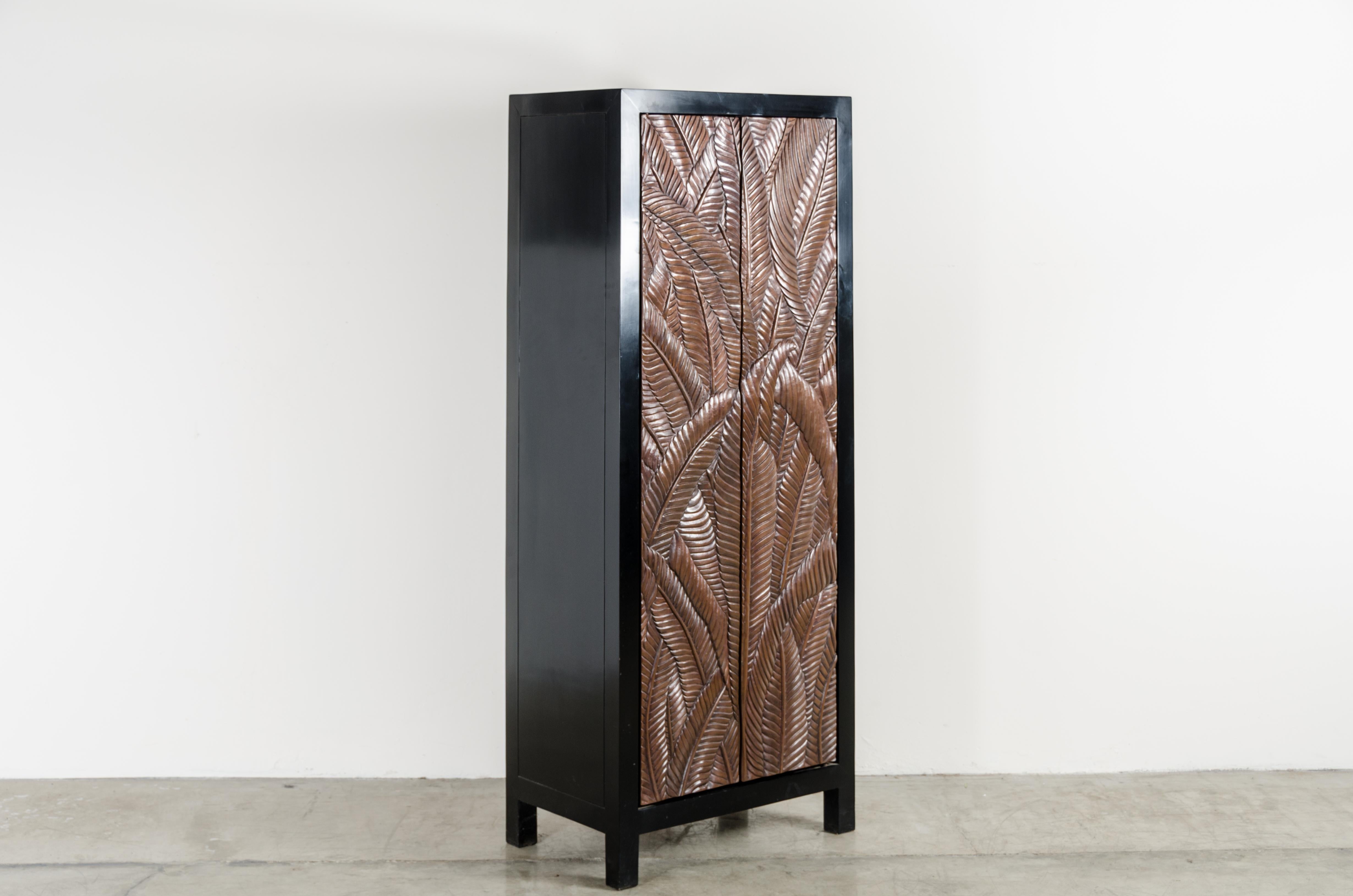 Banana leaf design narrow cabinet
Antique copper
Hand repousse
Limited Edition
Each piece is individually crafted and is unique.

Lacquer is a technique that dates back to the Shang dynasty, circa 1600-1100 B.C. The pieces are made with at