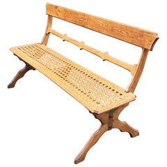 Banc art nouveau en chêne, assise en cannage circa 1900