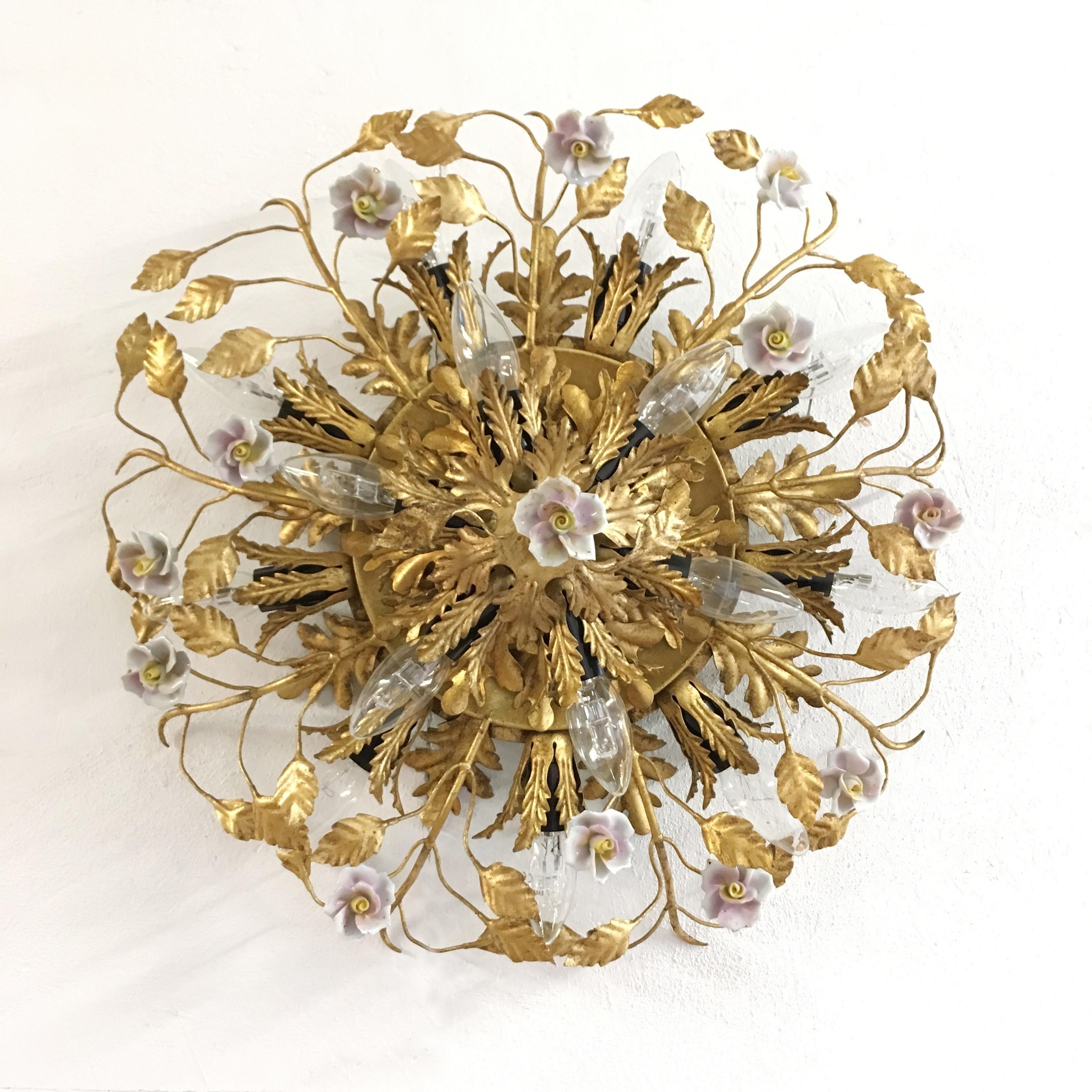 Italian Florentine flush mount ceiling light
Beautiful gilt acanthus leaf double layered flush light, with winding gilt stems, small gilt leaves and beautiful handcrafted porcelain flowers in pale pink
Banci Firenze, Italy,
1950s original
