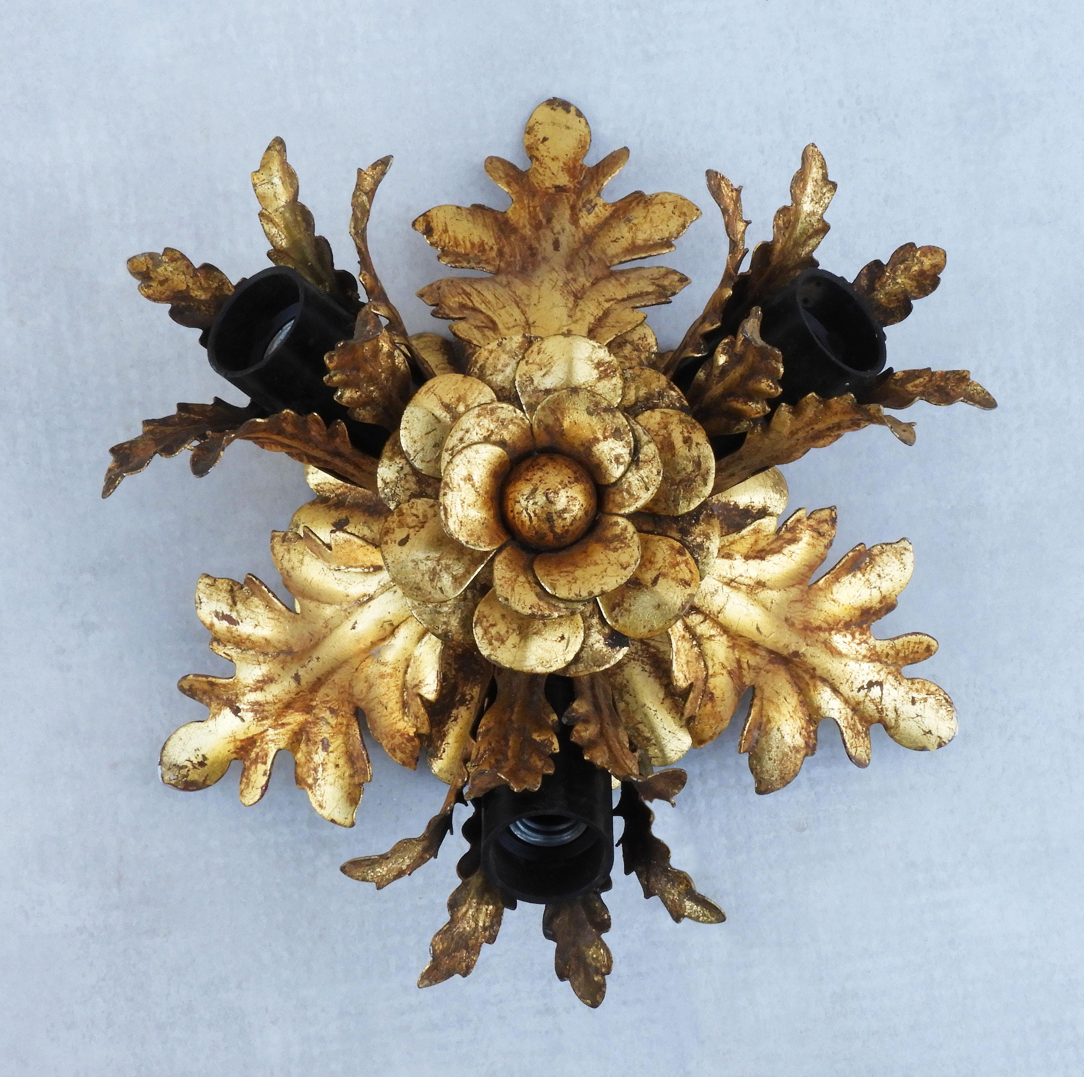 Italian flush mount light by Banci Firenze 1960s. Florentine-style gilded tole leaves and blooms, lightly distressed with nice colour and aged patina. In good vintage condition and rewired for your country with all new electrical parts.  Takes three