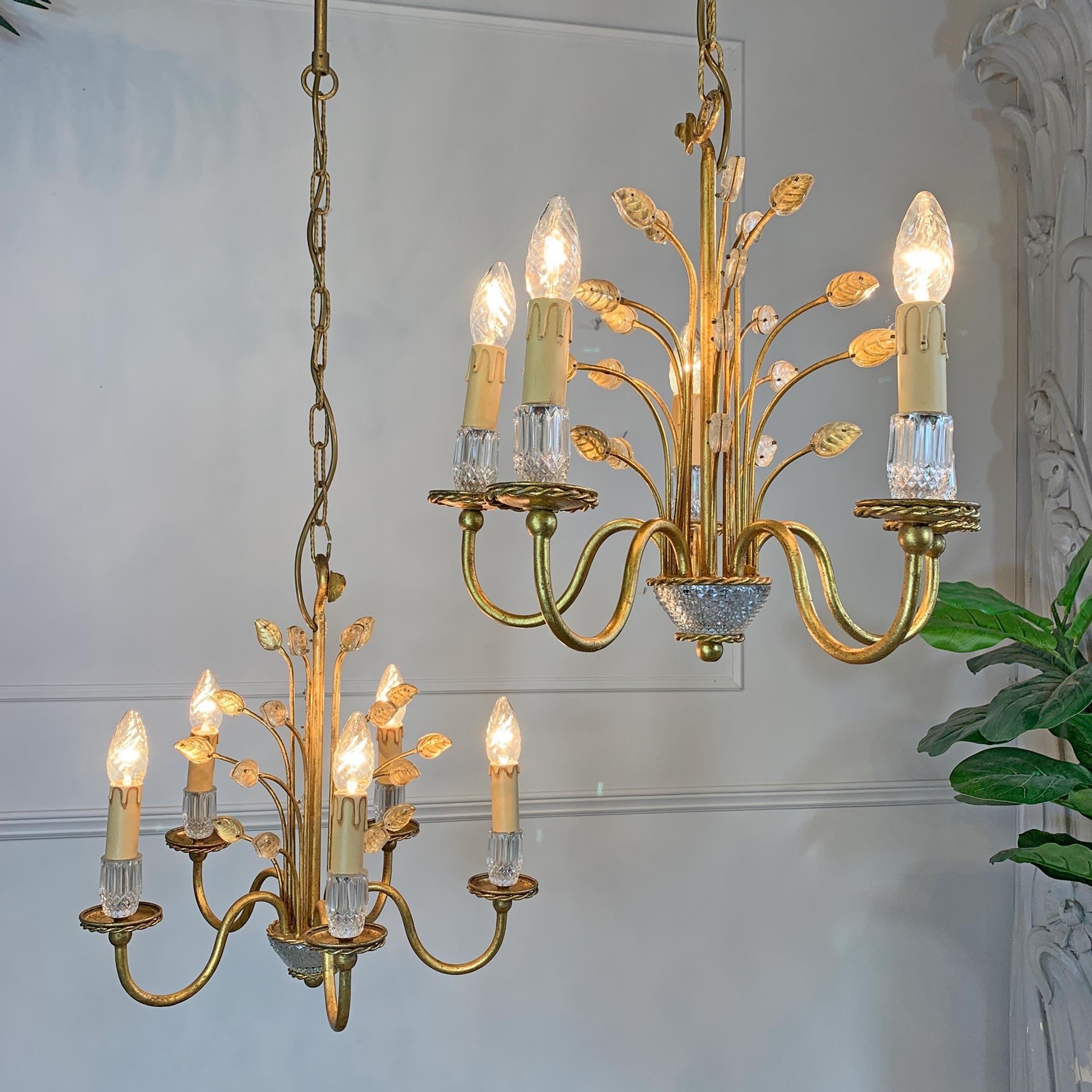 Striking gilt and glass Banci Firenze chandelier, Italian 1970s. This beautiful chandelier is hand crafted using Murano glass leaves set into a gilt iron body, to the bottom is an incredibly detailed rock crystal base, bearing five lamp holders, all