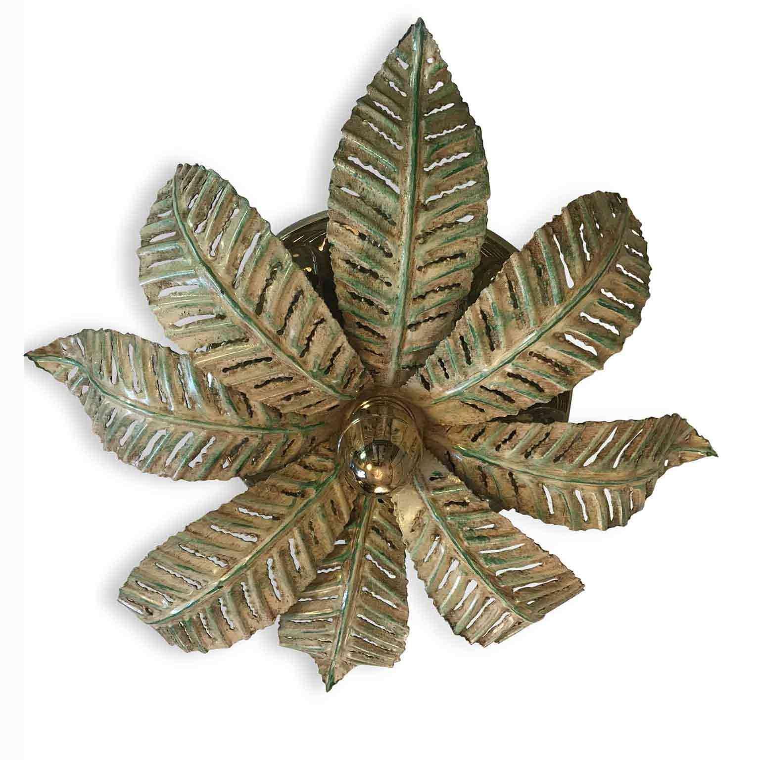 Italian eight-light ceiling fixture by Banci, manufactured by Banci Firenze. Eight-lights hidden by a round foliate iron structure painted with green pale accents, This original Italian design ceiling light is decorated with green painted pierced