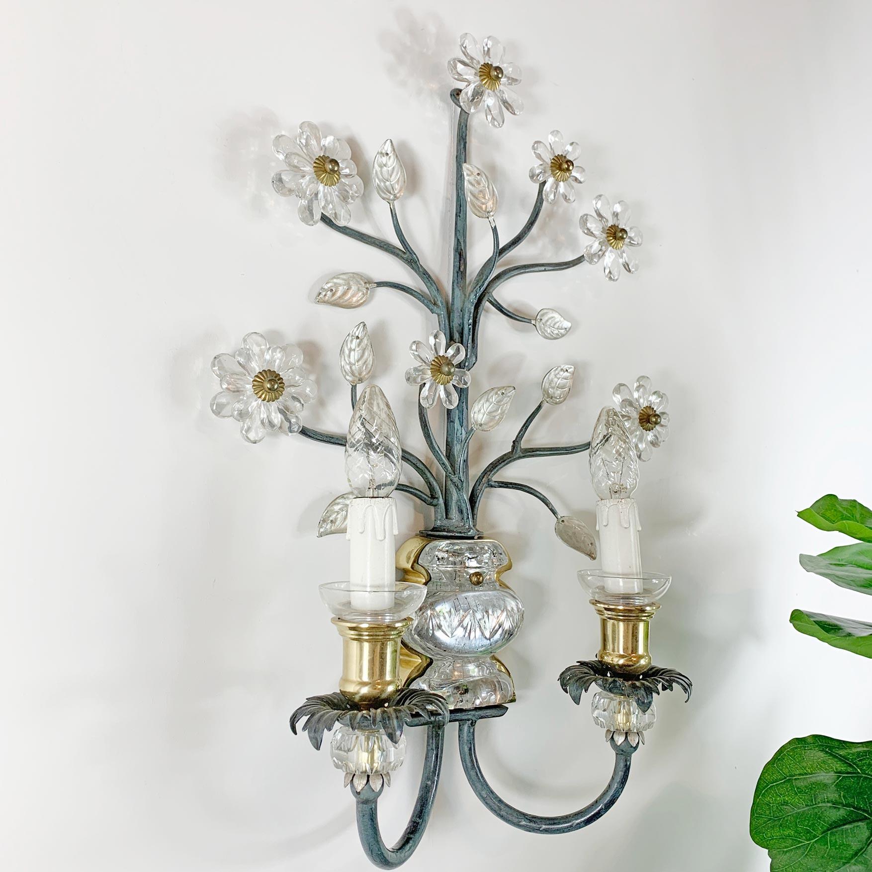 Banci Firenze Murano glass flower wall sconce
Italy circa 1970/80s

This Beautiful Sconce Has Many Stems Reaching Out To Murano Glass Flowers And Murano Glass Leaves With Gilt Leaf Underlay
There Is A Central Brass Urn With A Murano Glass Urn
