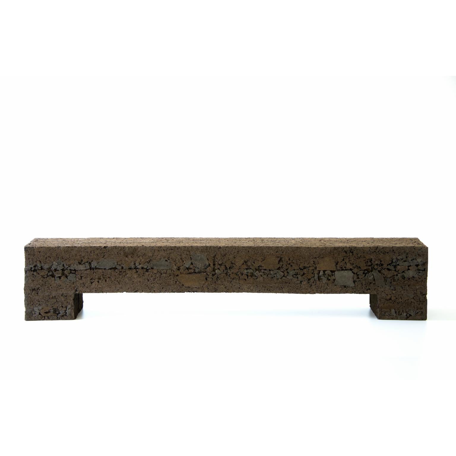 Banco Taipa Escudo Bench by Domingos Tótora Estúdio
Dimensions: W 32 x D 234 x H 44 cm
Materials: Recycled cardboard.

Domingos Tótora born and raised in Maria da Fé, a city in the mountainous region of Minas Gerais, Brazil, the artist chose