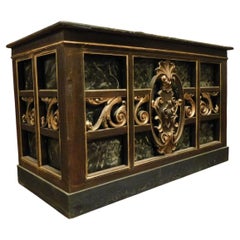 Decorative counter made of ebonized wood and finely carved, Italy
