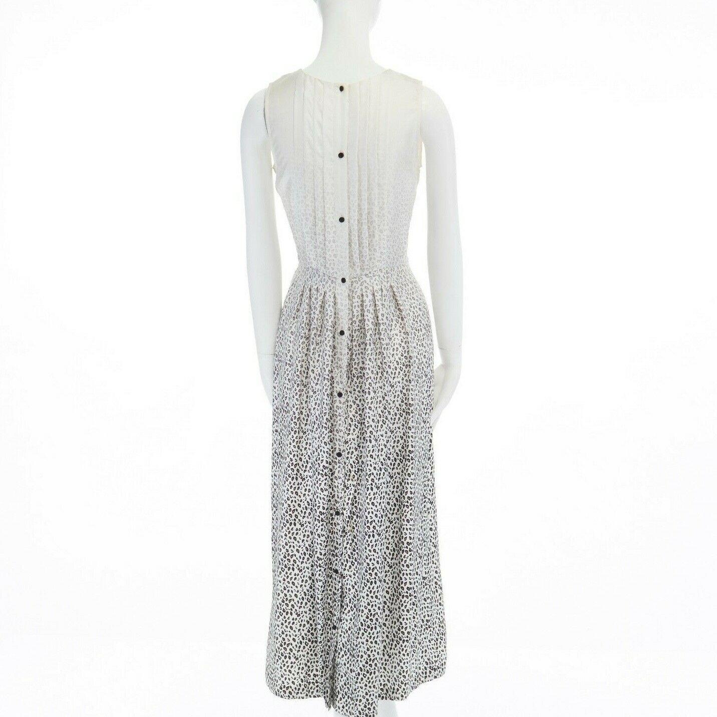 BAND OF OUTSIDER white washed gradient leopard print pleated silk maxi dress S 
Reference: LNKO/A00744 
Brand: Band of Outsiders 
Material: Silk 
Color: Cream 
Pattern: Leopard 
Closure: Zip 
Extra Detail: Silk. Cream base. Black and brown micro