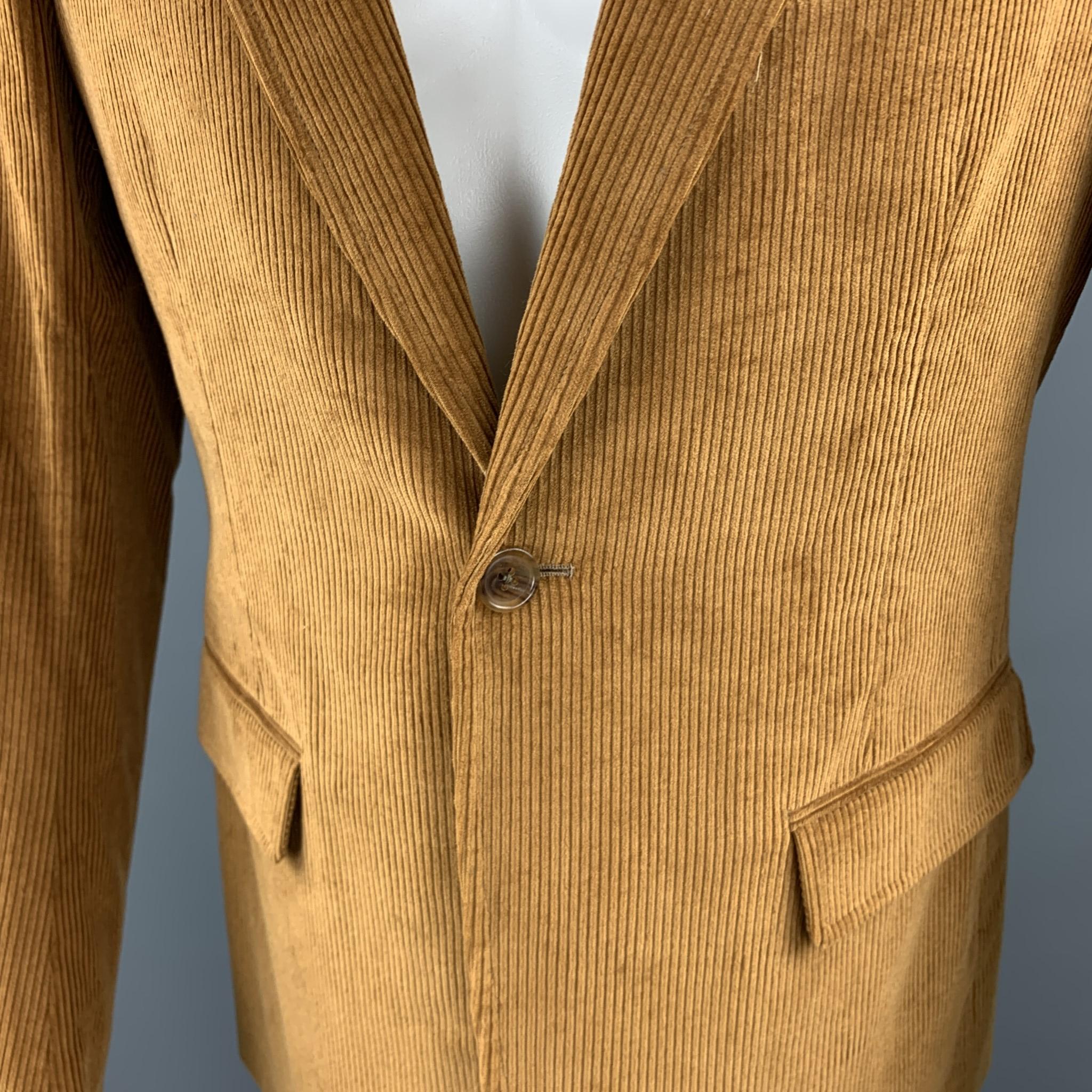 BAND OF OUTSIDERS sport coat comes in tan corduroy with a peak lapel, single breasted, one button front, and double vented back. Made in USA.

Excellent Pre-Owned Condition. 
Marked: JP 3

Measurements:

Shoulder: 17 in.
Chest: 40 in.
Sleeve: 25.5