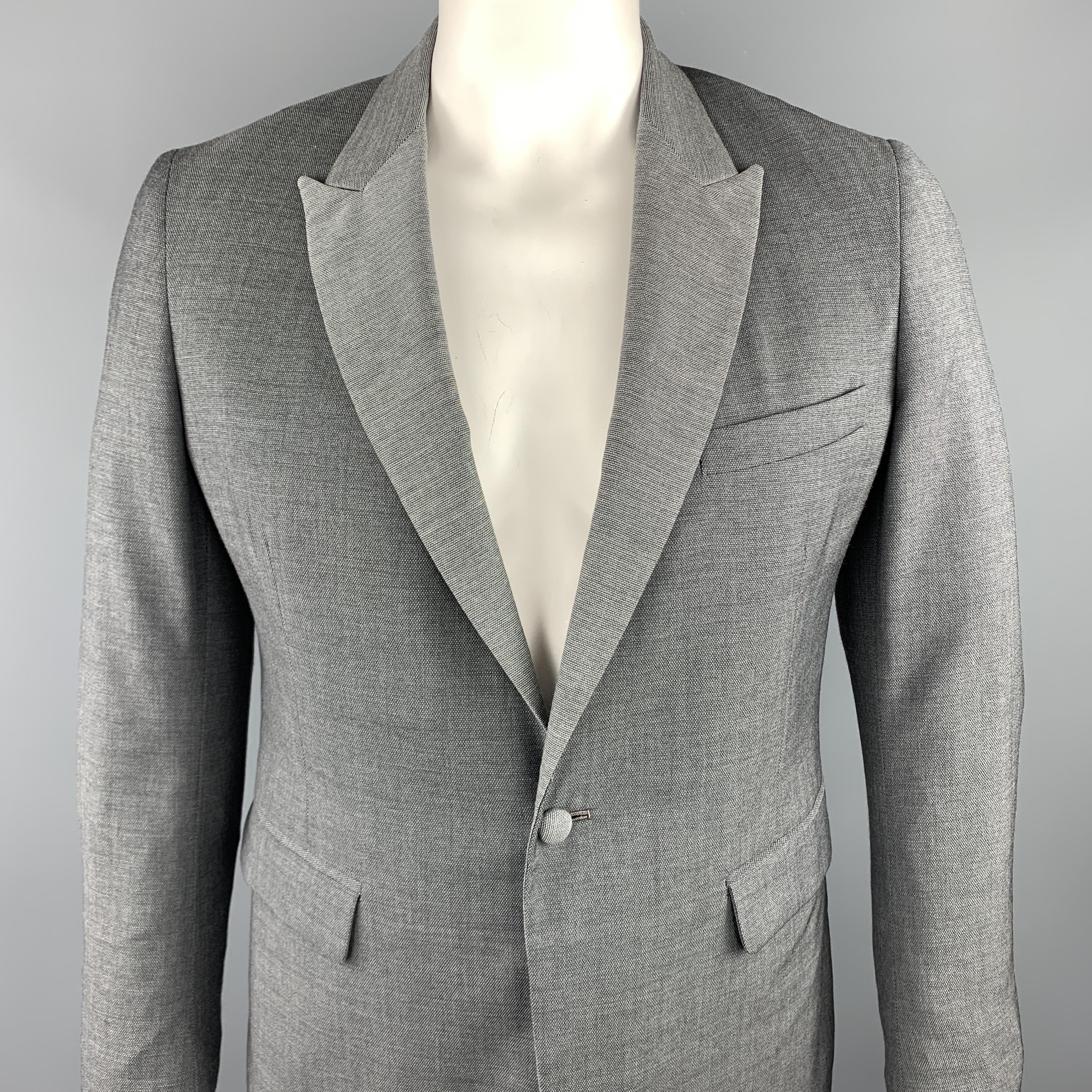 BAND OF OUTSIDERS sport coat comes in a gray nailhead wool featuring a peak lapel style, flap pockets, and a single button closure. Hand Tailored in USA. 

Excellent Pre-Owned Condition.
Marked: US 42

Measurements:

Shoulder: 17 in. 
Chest: 42 in.