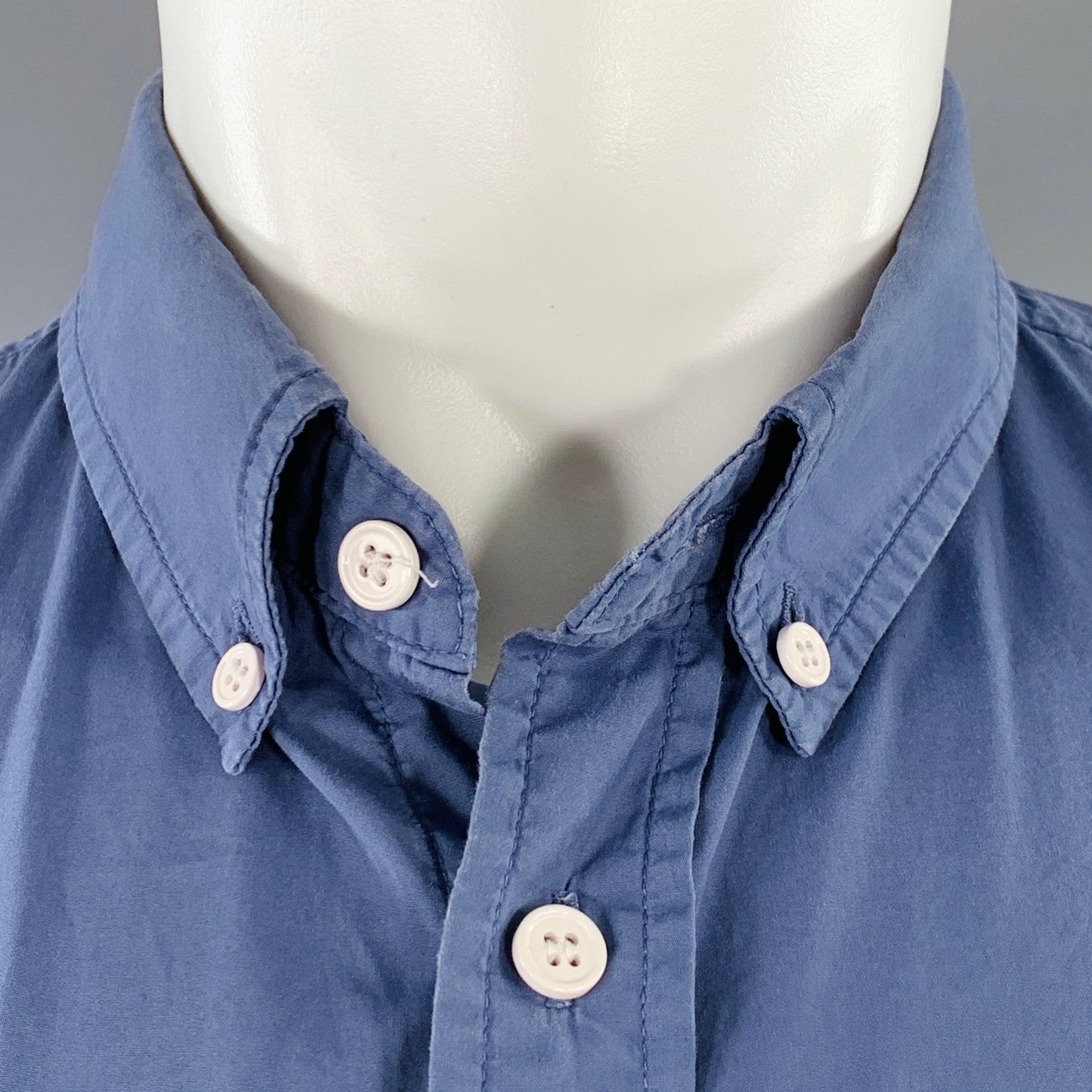 BAND OF OUTSIDERS long sleeve shirt in a blue cotton woven fabric featuring a button down collar, one pocket, and button closure. Made in USA.Very Good Pre-Owned Condition. Multiple minor marks, please check photos. As is. 

Marked:   2