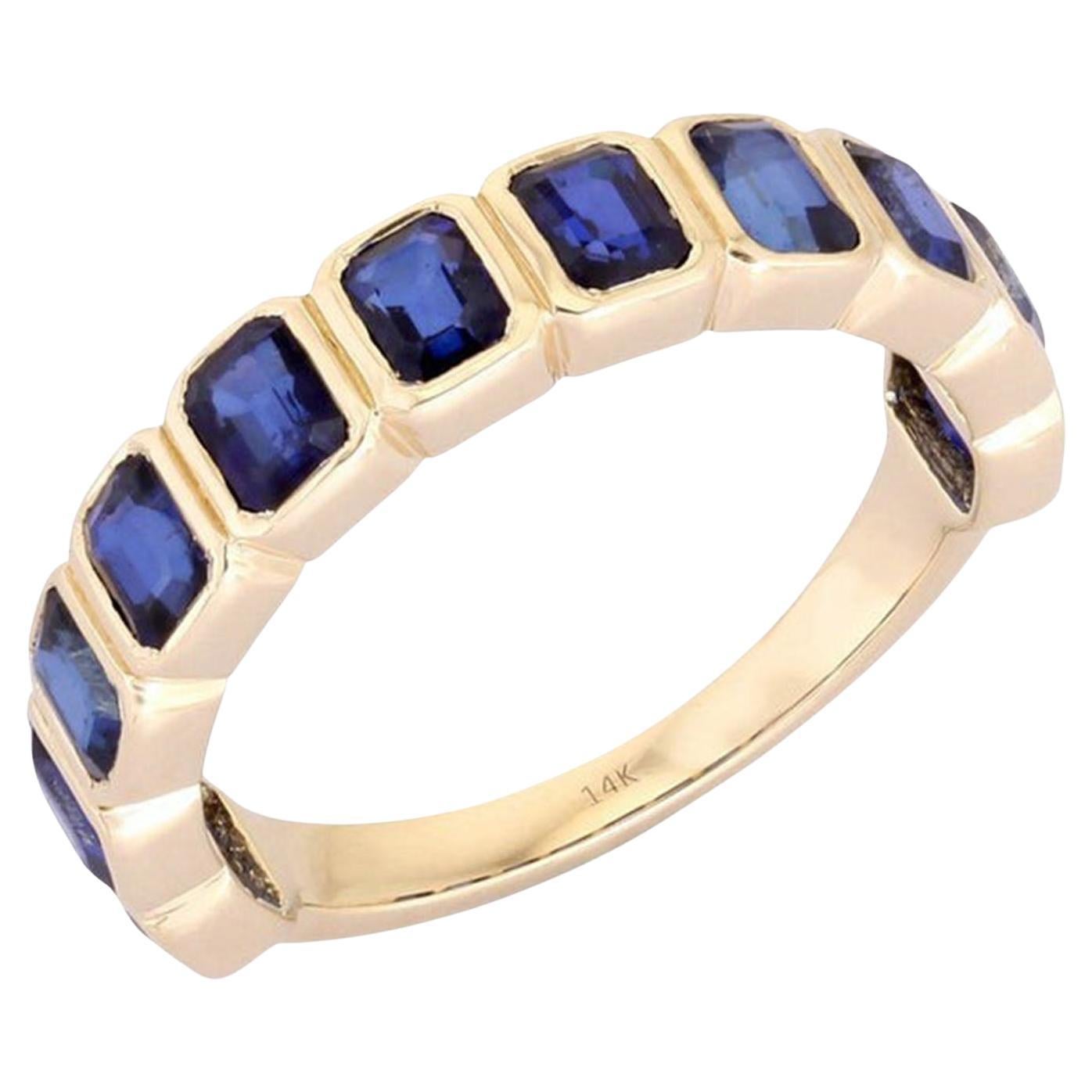 Anillo de 14 quilates (o 18 quilates bajo pedido) de oro amarillo con zafiro azul talla esmeralda en venta