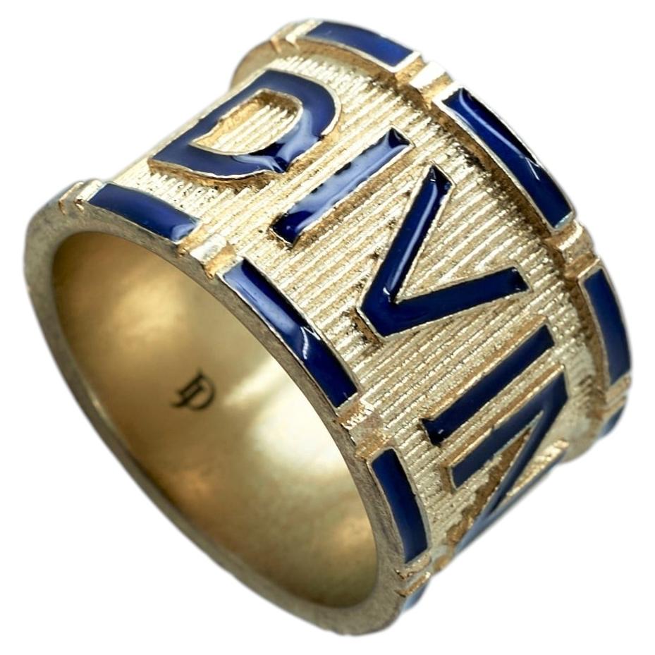 Bague en or avec émail bleu, bandeau de cigare « Divine Word » et devise en vente