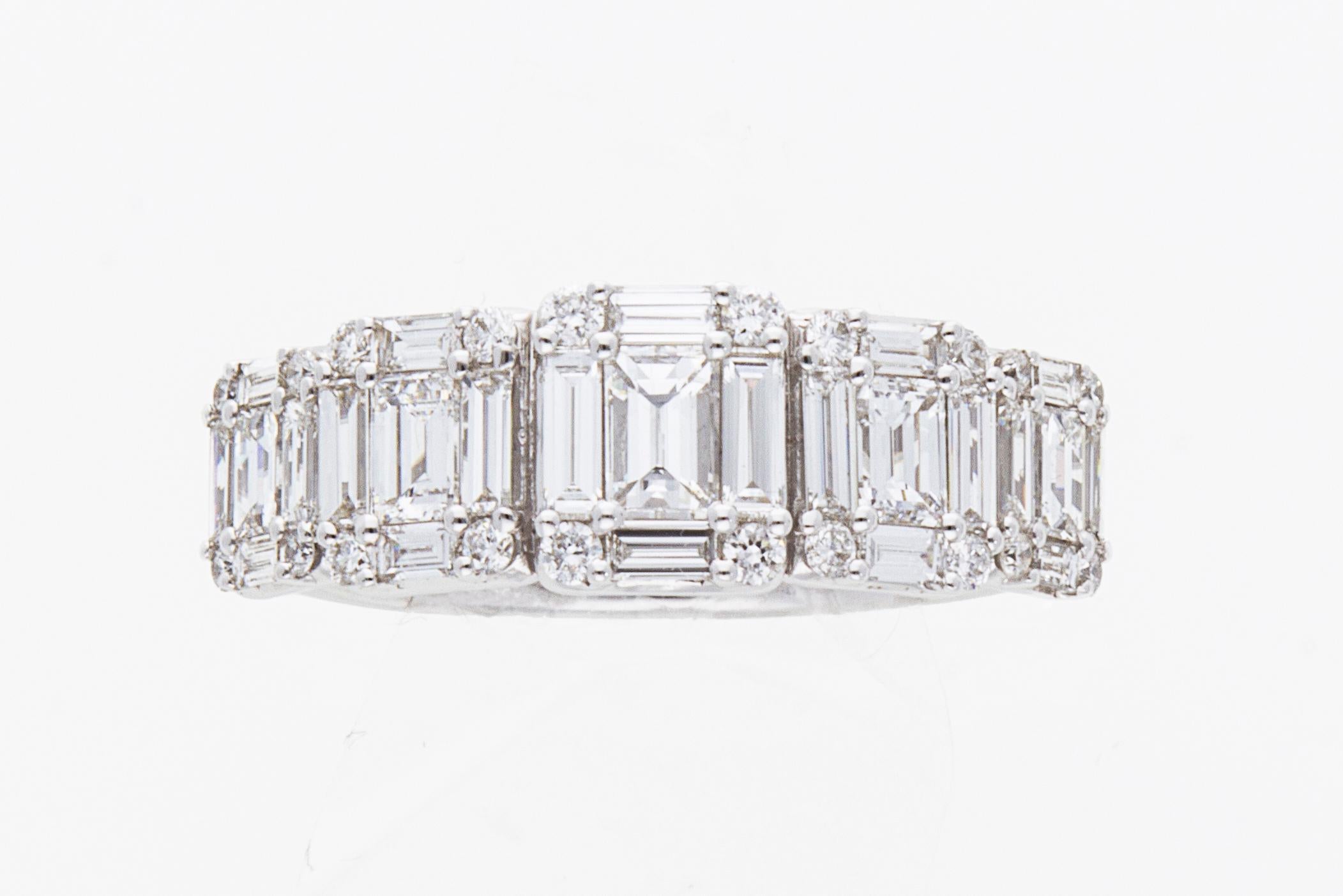 Band Ring ct 1.47 of Brilliant and Baguette Cut Diamonds. 18 kt gold
The band model ring is made up of 5 rectangular elements on which, on each one there are: 4 brilliant-cut diamonds and 5 baguette-cut diamonds. 
Total number of diamonds N° 45.