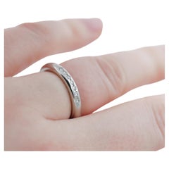 Band ring in platinum with 7 brilliant-cut diamond