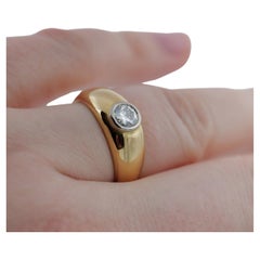 Band ring in yellow gold with brilliant-cut diamond
