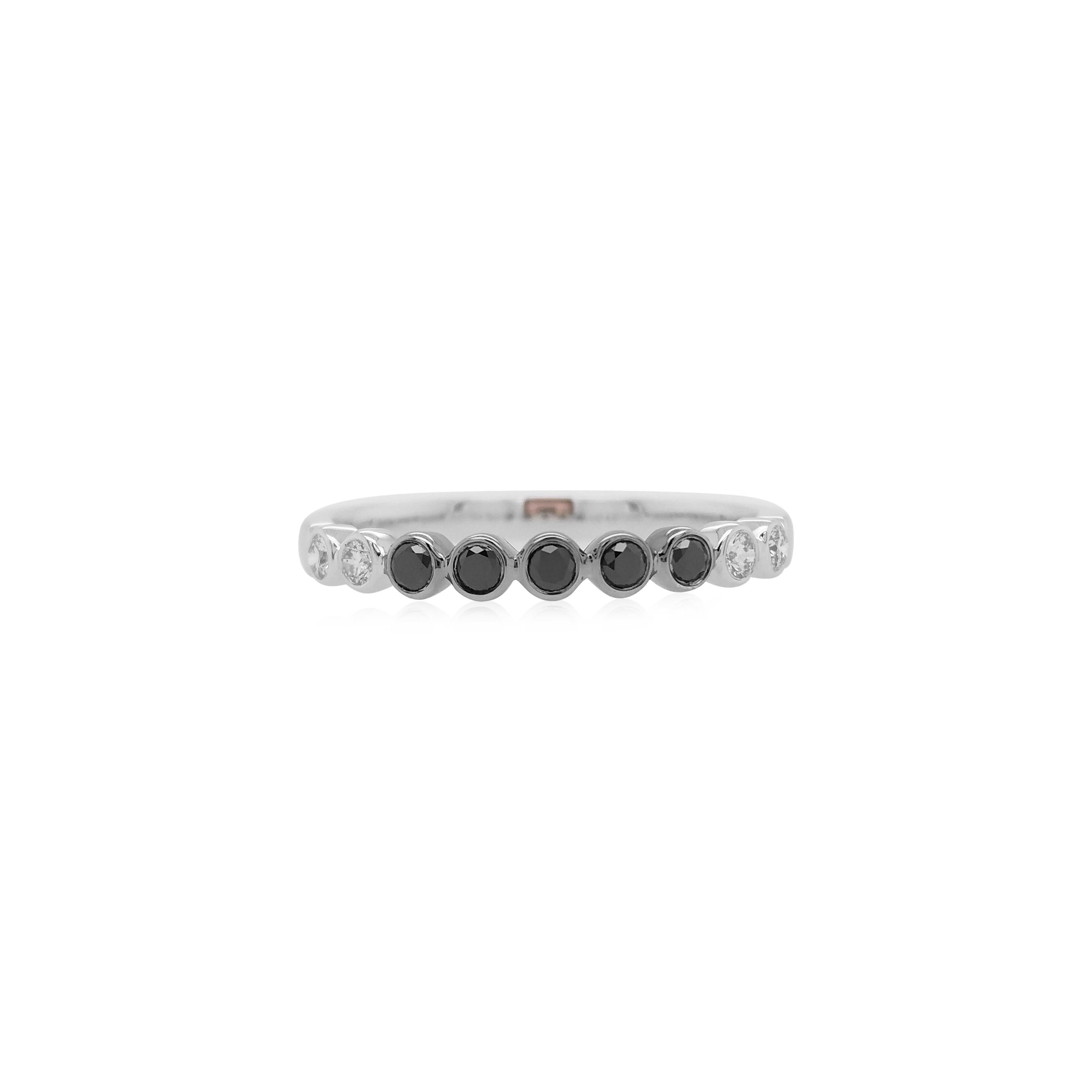 A simple yet elegant ring with black diamonds to add a unique style to your everyday look.

Black Diamonds- 0.13 cts
White Diamond - 0.09 cts

HYT Jewelry is a privately owned company headquartered in Hong Kong, with branches in Tokyo, New York, and