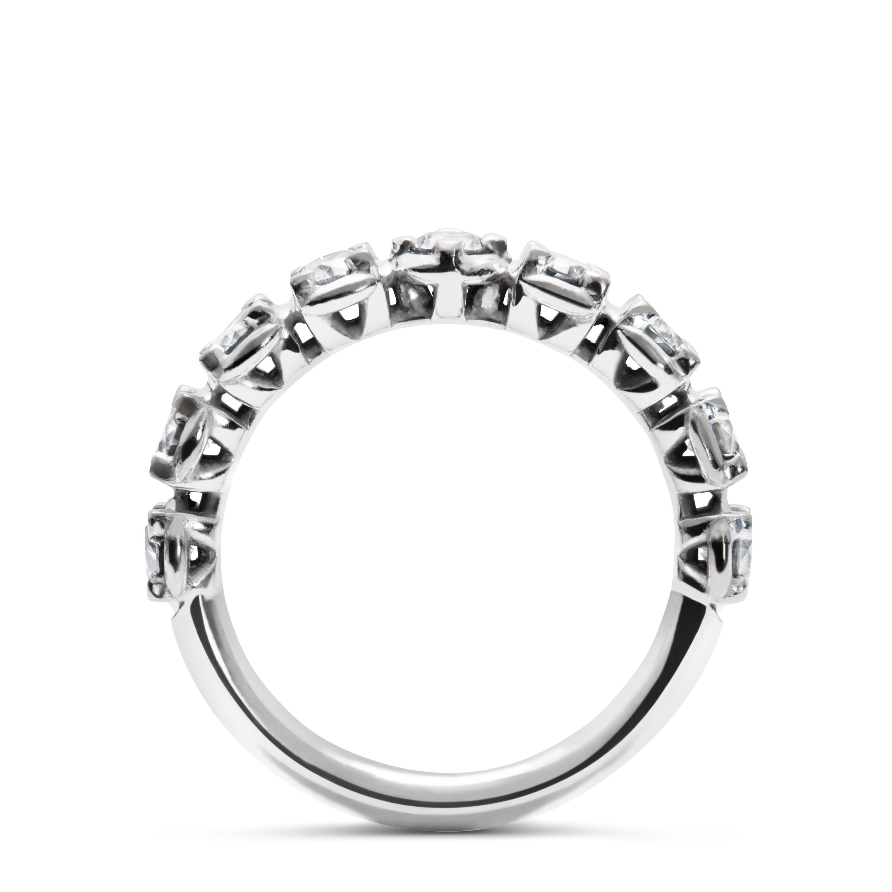 The Rocks For Life band ring is designed to maximise the brilliance and luminosity of the 9 brilliant cut diamonds, with a total weight of 0.99 carat. Our distinctive halo is carefully engineered to elevate each diamond, emphasizing their size while