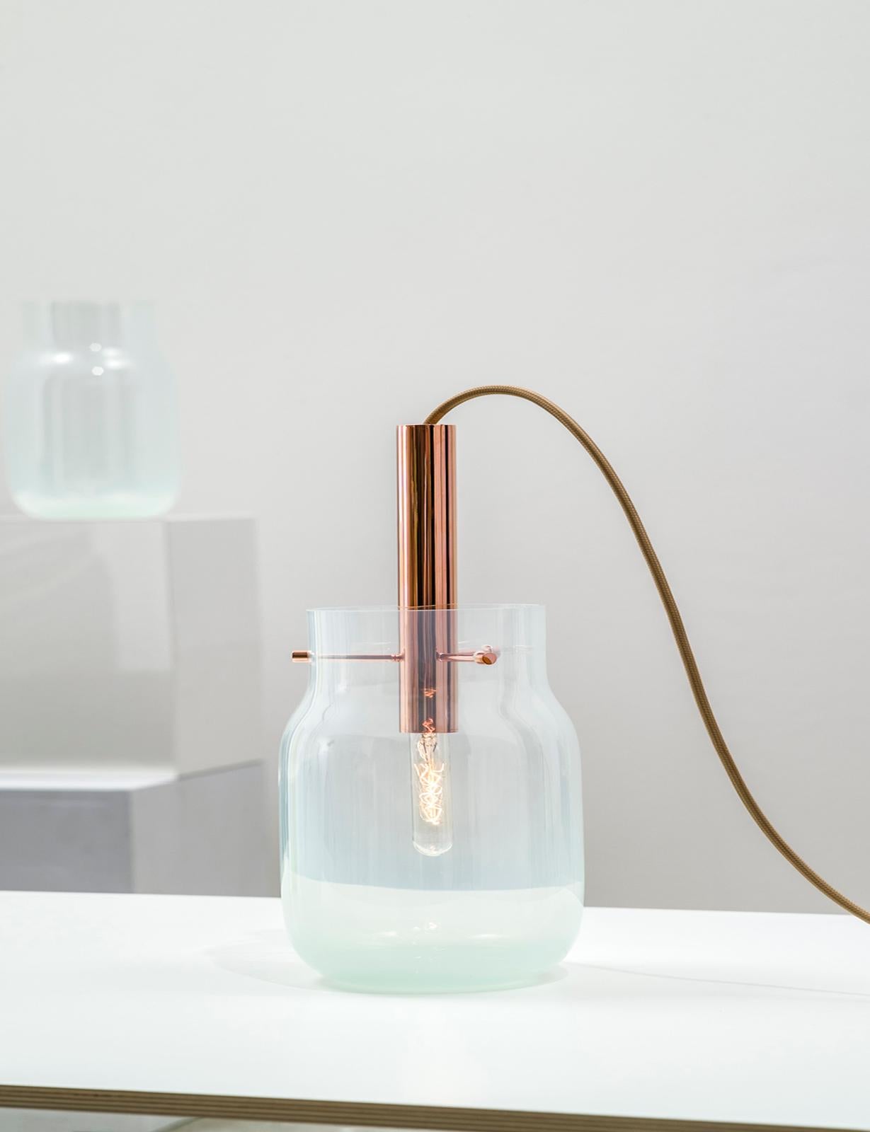 Bandaska table light by Dechem Studio
Dimensions: D 18 x H 24 cm
Materials: brass, glass.
Also available: different colours and sizes available
hand blown into beechwood moulds, Bandaska Lights is based on the highly popular Bandaska Vase