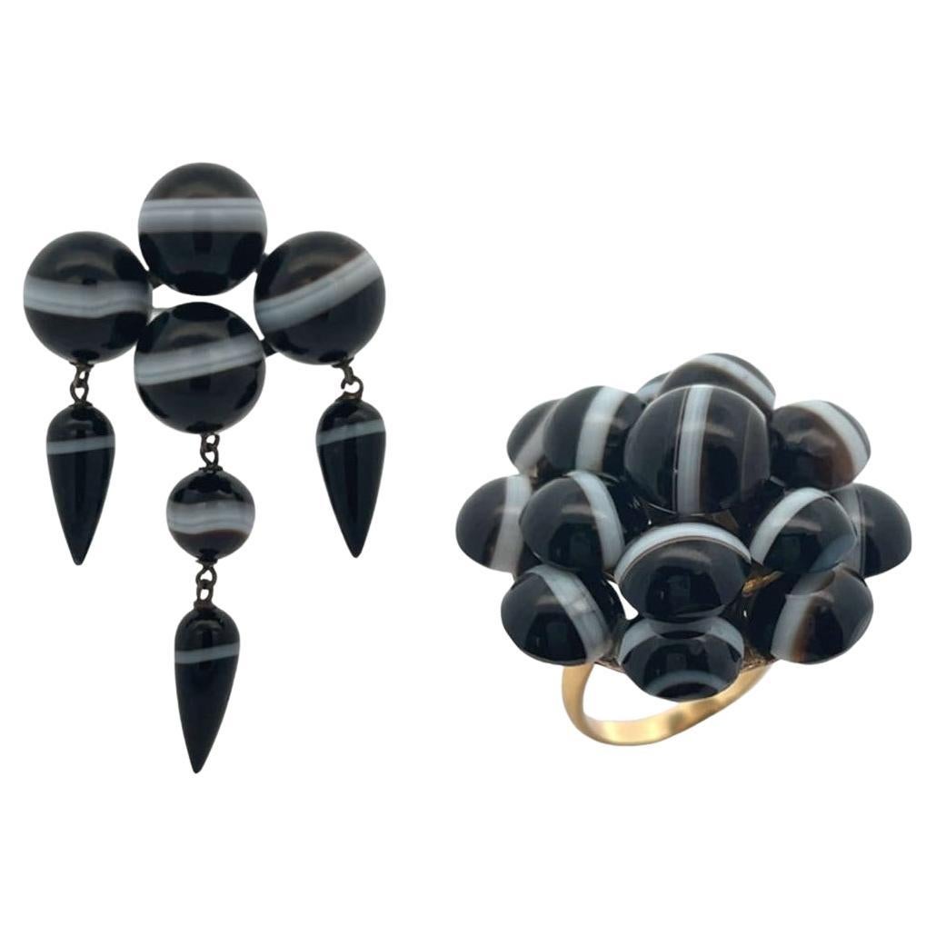 Set di anelli e spille di agata a fascia