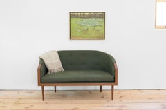 Loveseat with Walnut Banded Barrel Back, Hand-Turned Legs and Tufting
