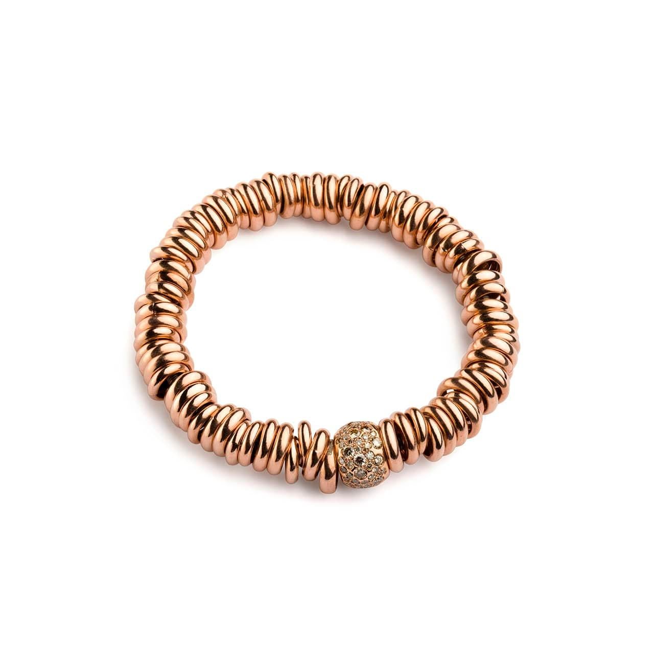 Bang Silver Bracelet / Cognac rose gold. Stretch silver rose gold bracelet with cognac diamonds (ct. 0,92) set in rose gold 18kt.
The unconventional lines of the Bang elastic bracelets associate a steel core with ring elements in silver, gold,