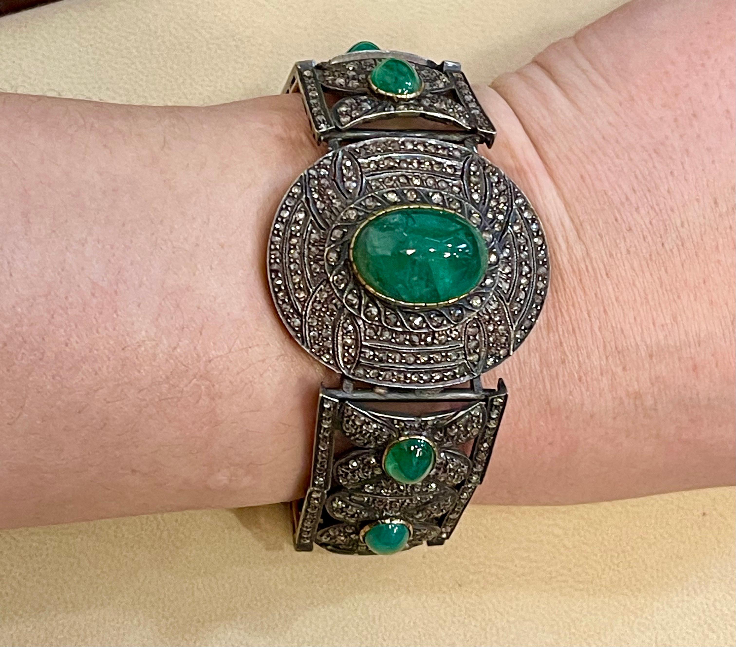 Big statement piece !
Bangle Bracelet Victorian Diamond Emerald Cabochon 14K Gold, Silver, Yellow Gold
This exceptionally affordable Tennis  bracelet has 9 Emerald Cabochon .
Oval shape natural emeralds, 8 of them are same size , 4 on each side