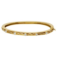 Vintage Bangle Bracelet with 5 Swirls in 14k Yellow Gold and Diamonds