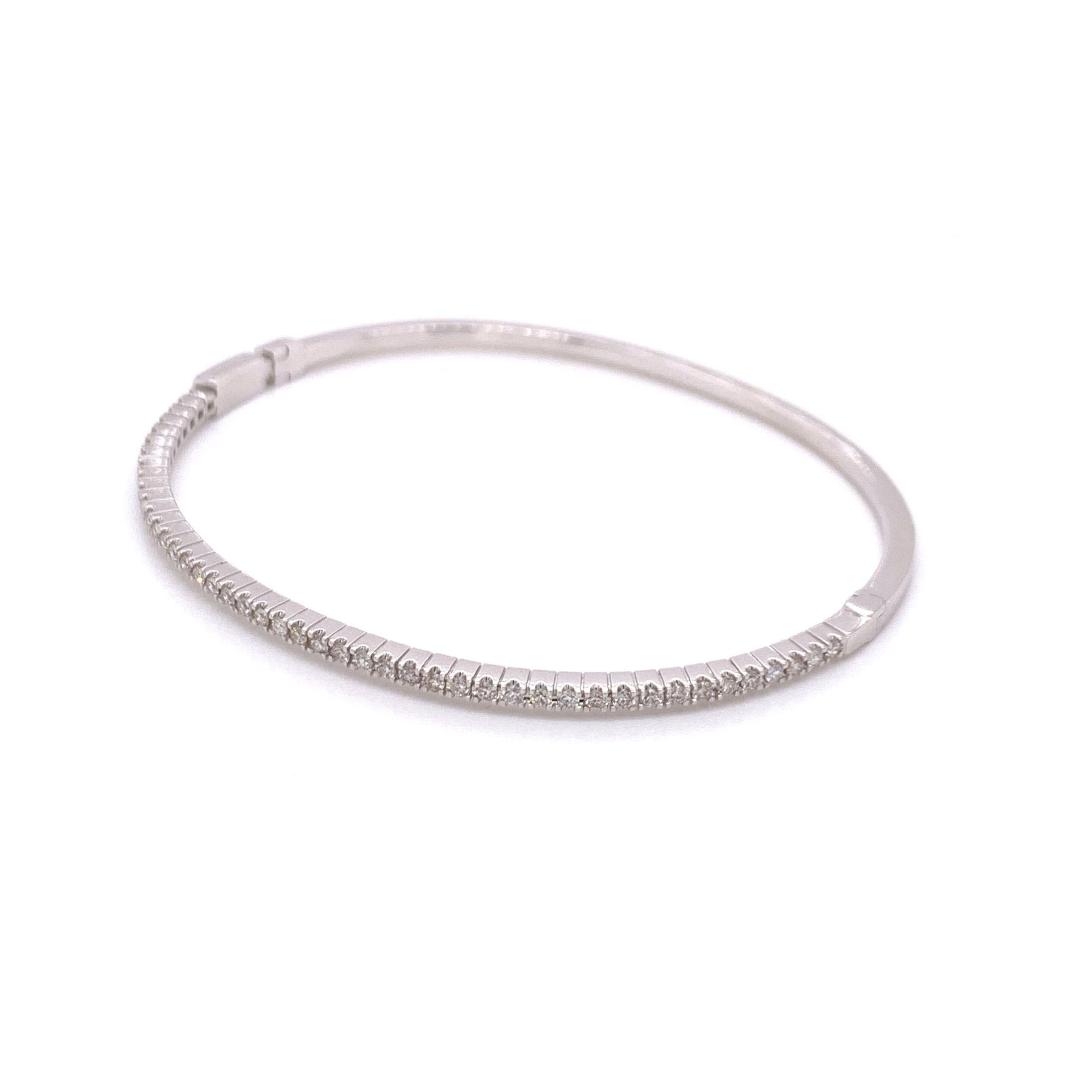 Bangle Diamond Half Tennis bracelet made with real/natural brilliant cut diamonds. Diamond Weight: 0.60 carats, Diamond Quantity: 45 (round diamonds), Color: G-H, Clarity: VS. Mounted on 18 karat white gold. 