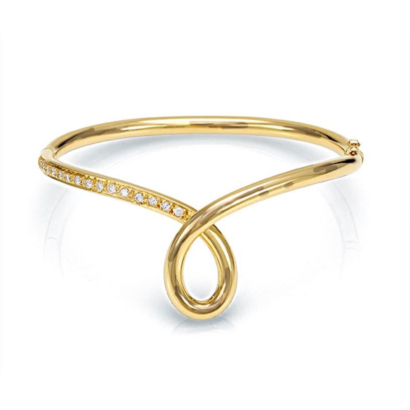 Essence bangle in 18 kt  yellow gold and white diamonds 
This classic collection in Micheletto tradition

the total weight of the gold is  gr 28.70
the total weight of the white diamonds is ct 0.38 - color GH clarity VVS1

STAMP: 10 MI ITALY