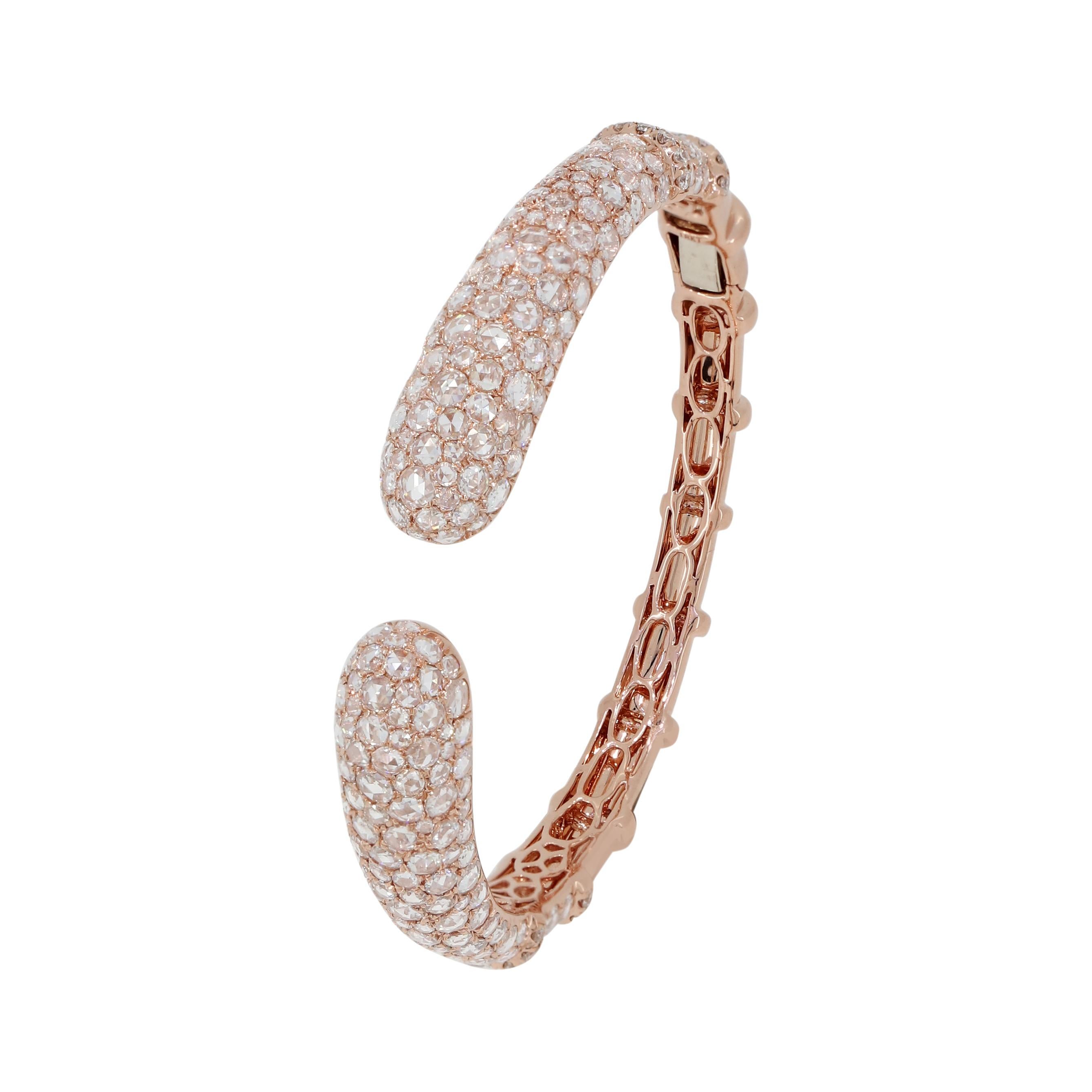 A stunning bangle crafted by Nigaam in 18K Rose gold with delicate diamond detailing 8.36 Ct total weight is designed to make you fall in love with sophistication and shine.
Please follow the Luxury Jewels storefront to view the latest collections &