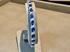 Bangle in Platinum 900 with natural blue Sapphires and Diamonds