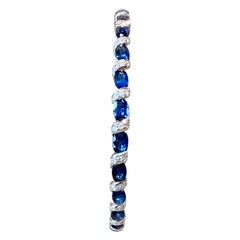 Bangle in Platinum 900 with natural blue Sapphires and Diamonds