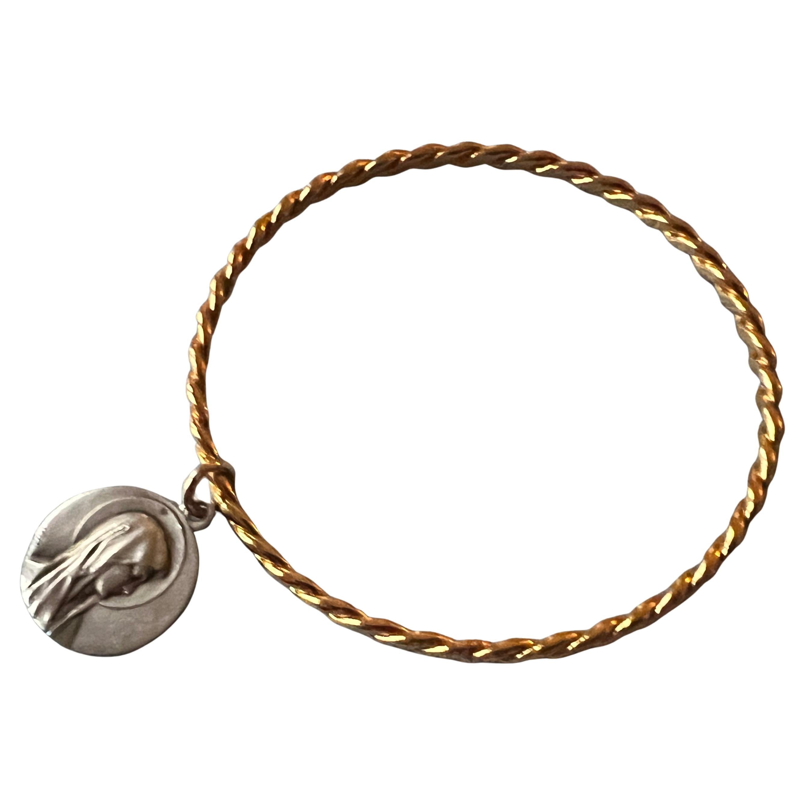 Bangle Virgin Mary Medal Silver Charm Bracelet 

Gold plated Brass
Measurement in diameter is 65 mm.

Size Medium ( also fits a larger Small and a smaller Large)

Designer: J DAUPHIN 

Available for immediate delivery 