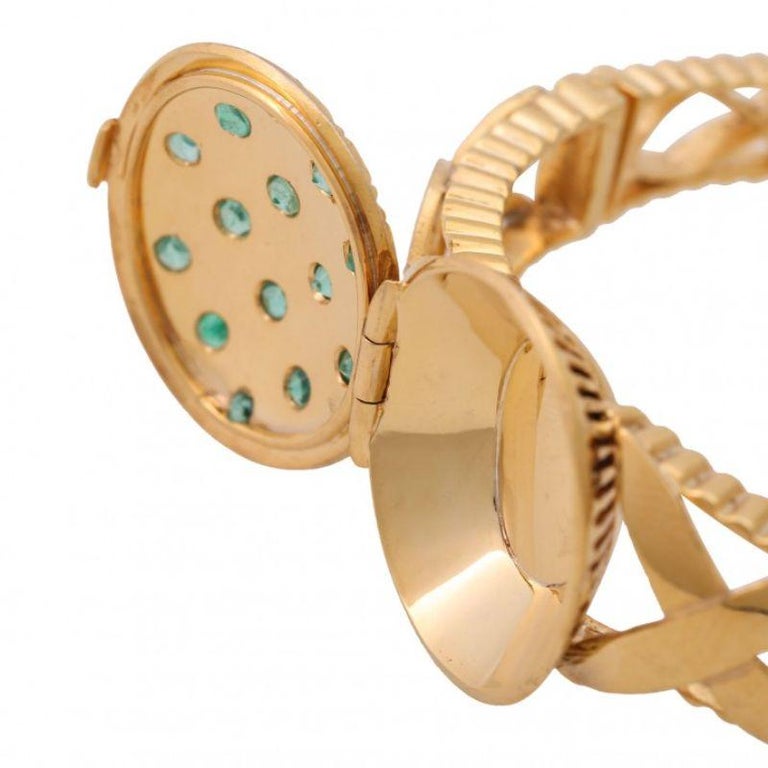 Bangle with Emerald-Encrusted Opening Capsule Top For Sale at 1stDibs
